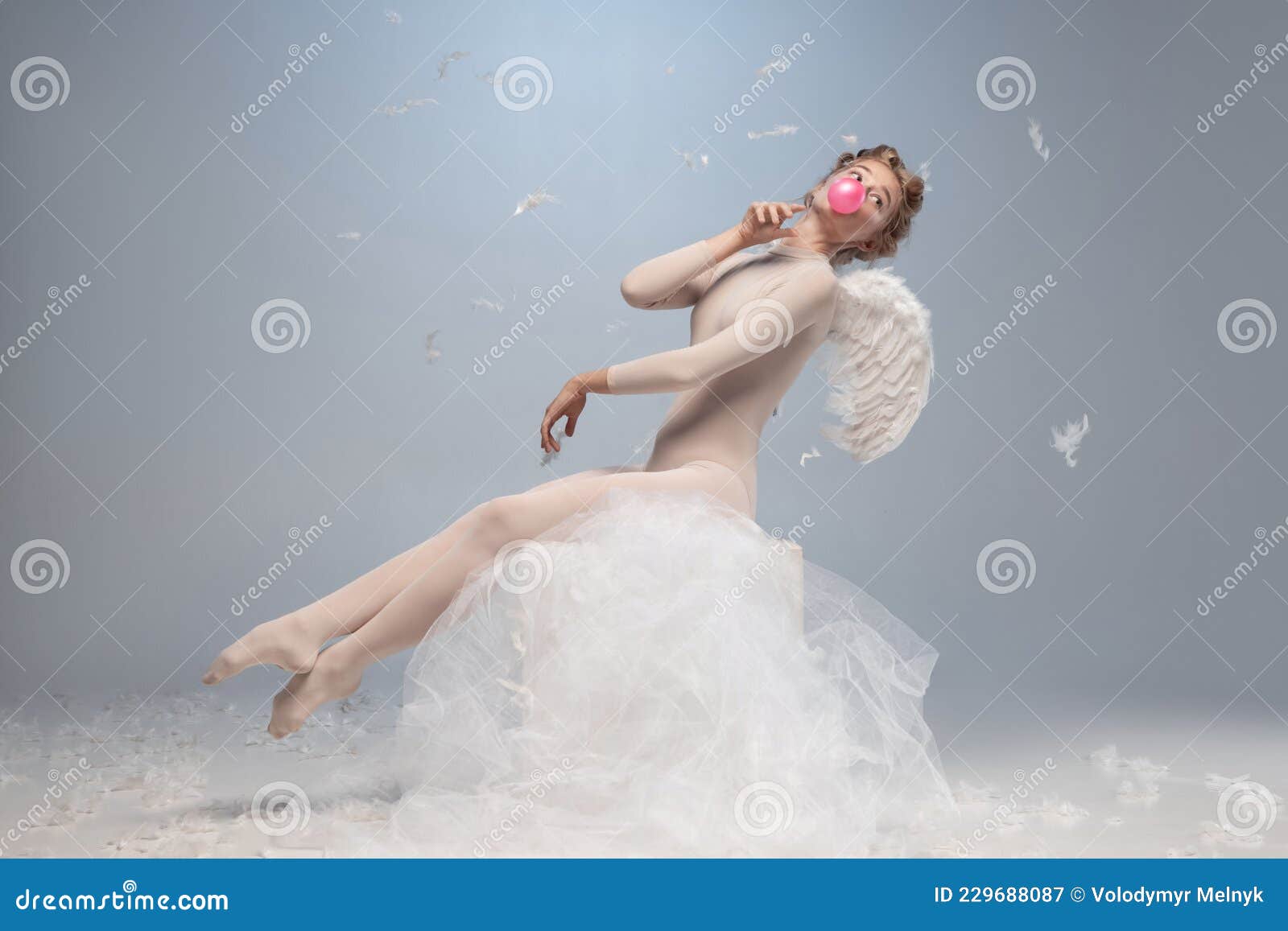 Silly Mood. Beautiful Young Girl, Graceful Ballerina Image of Angel Wings Sitting on Cloud on White Stock Image - Image of flying, angel: 229688087