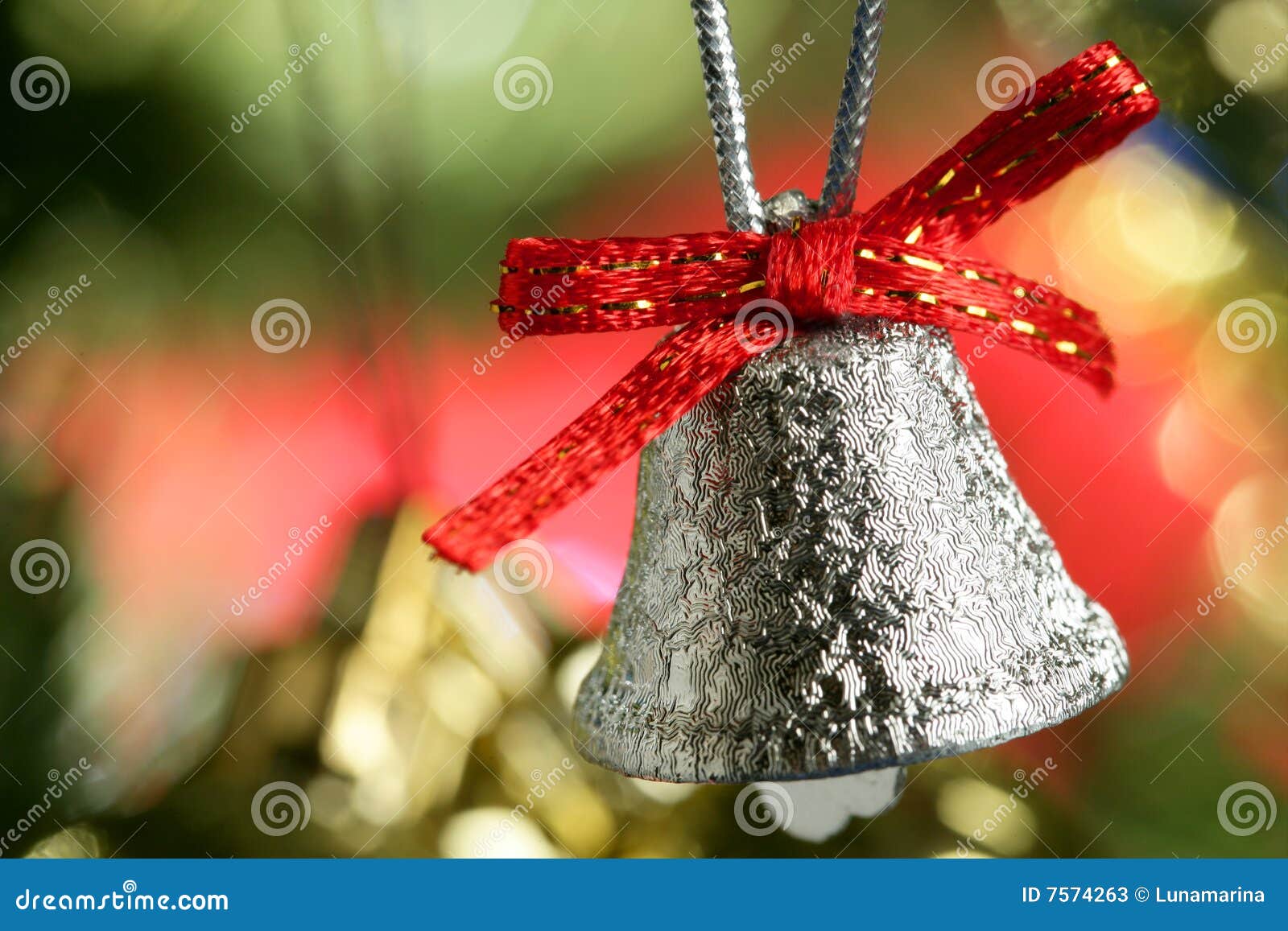 Silver Bell In The Christmas Tree With Red Ribbon Stock 
