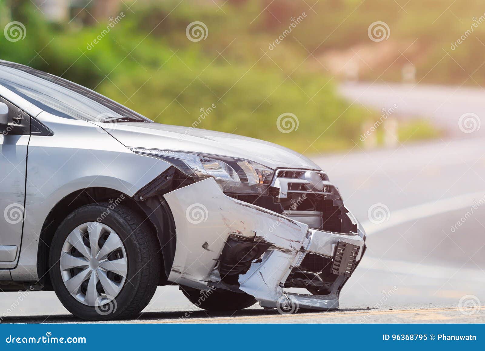 Silver Car Get Damaged by Crash Accident on the Road. Car Repair Stock
