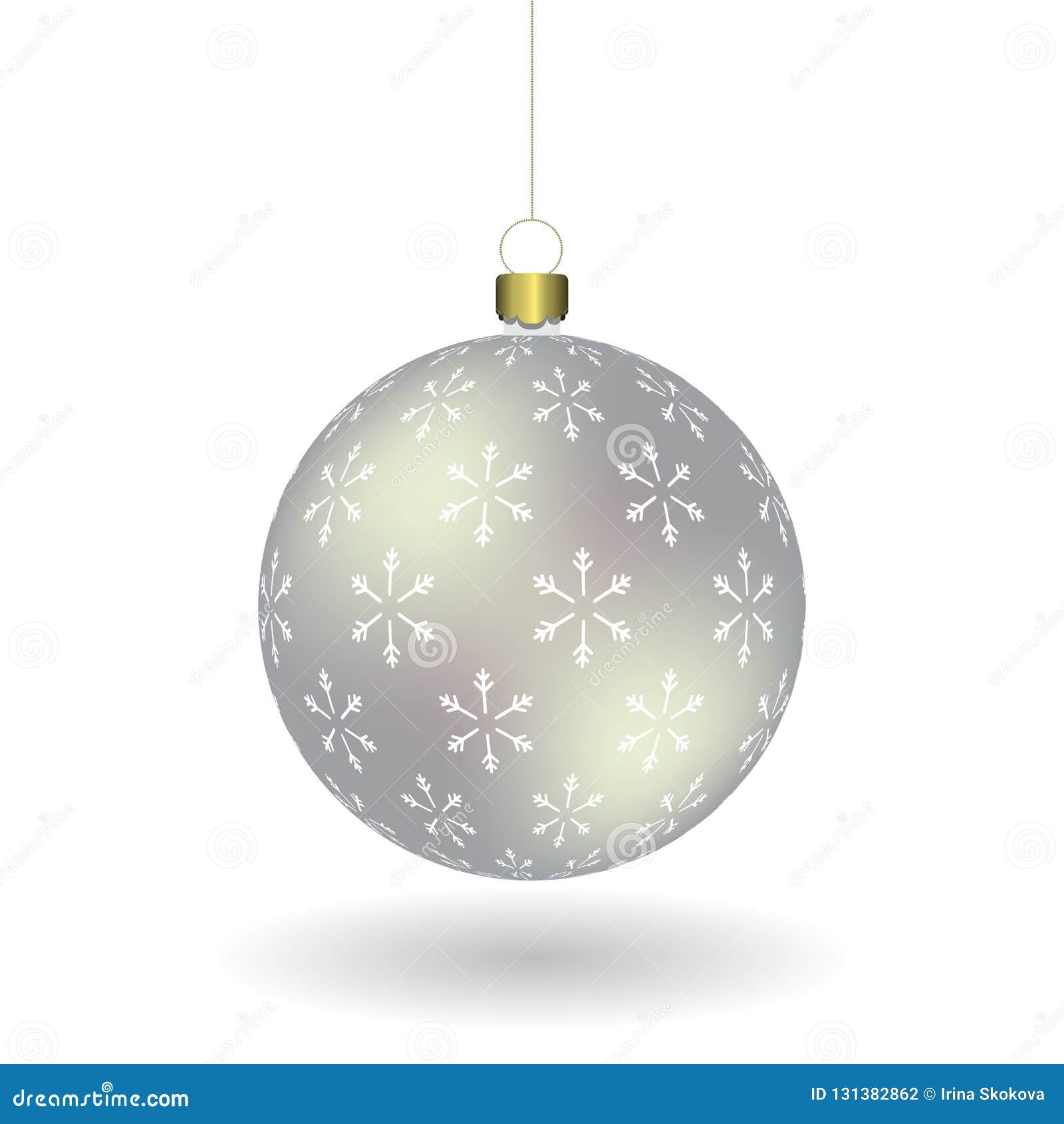 silver christmass ball with snowflakes print hanging on a golden chain