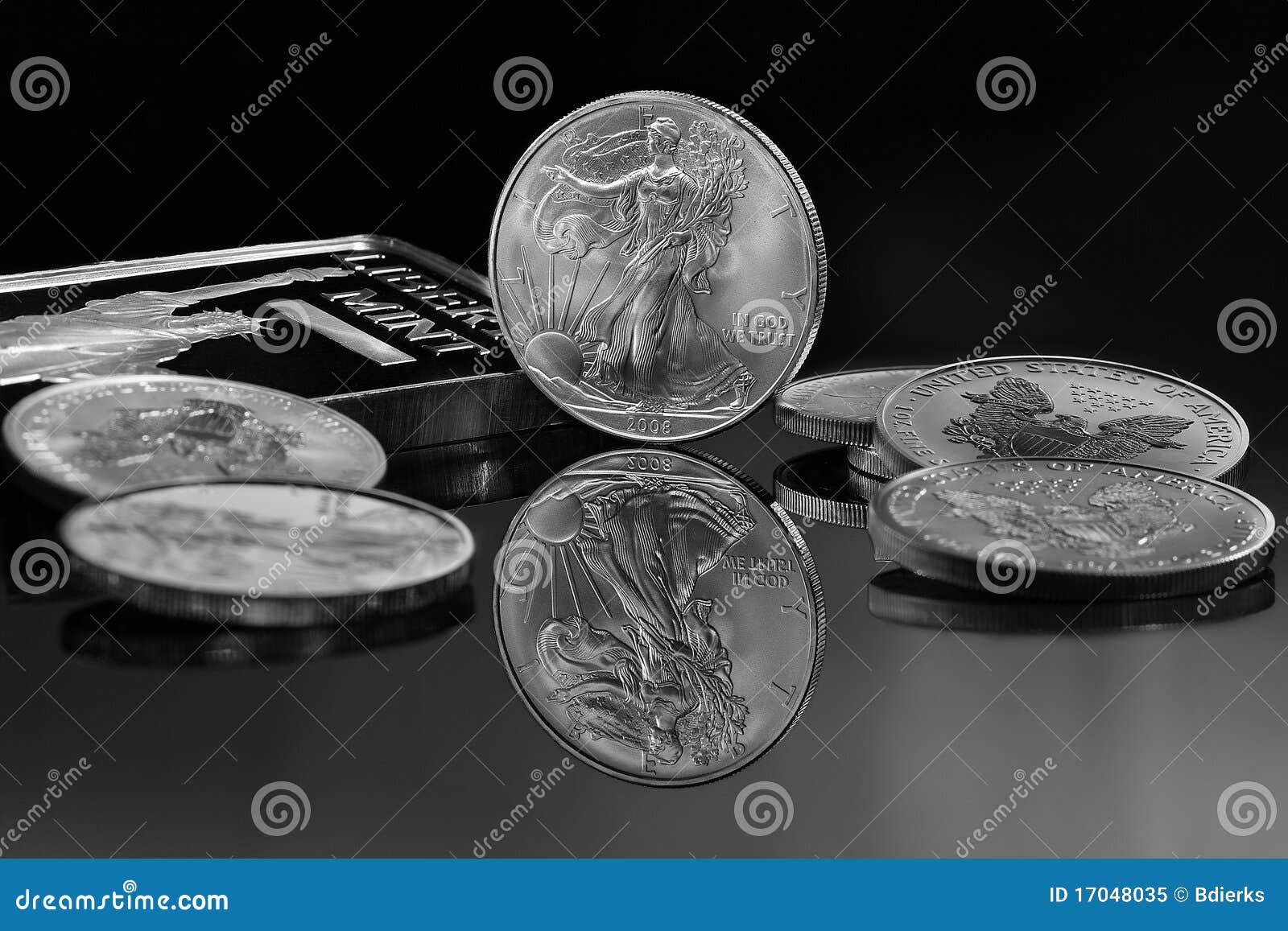 silver coins and silver bar