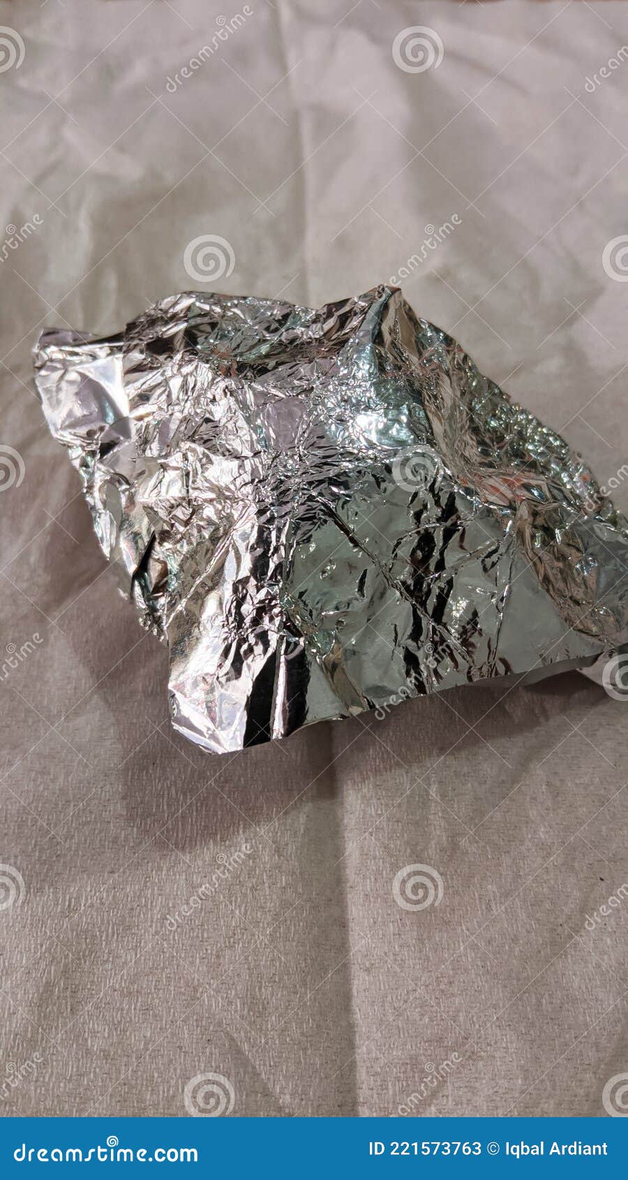 silver colored aluminum foil on white tissue.