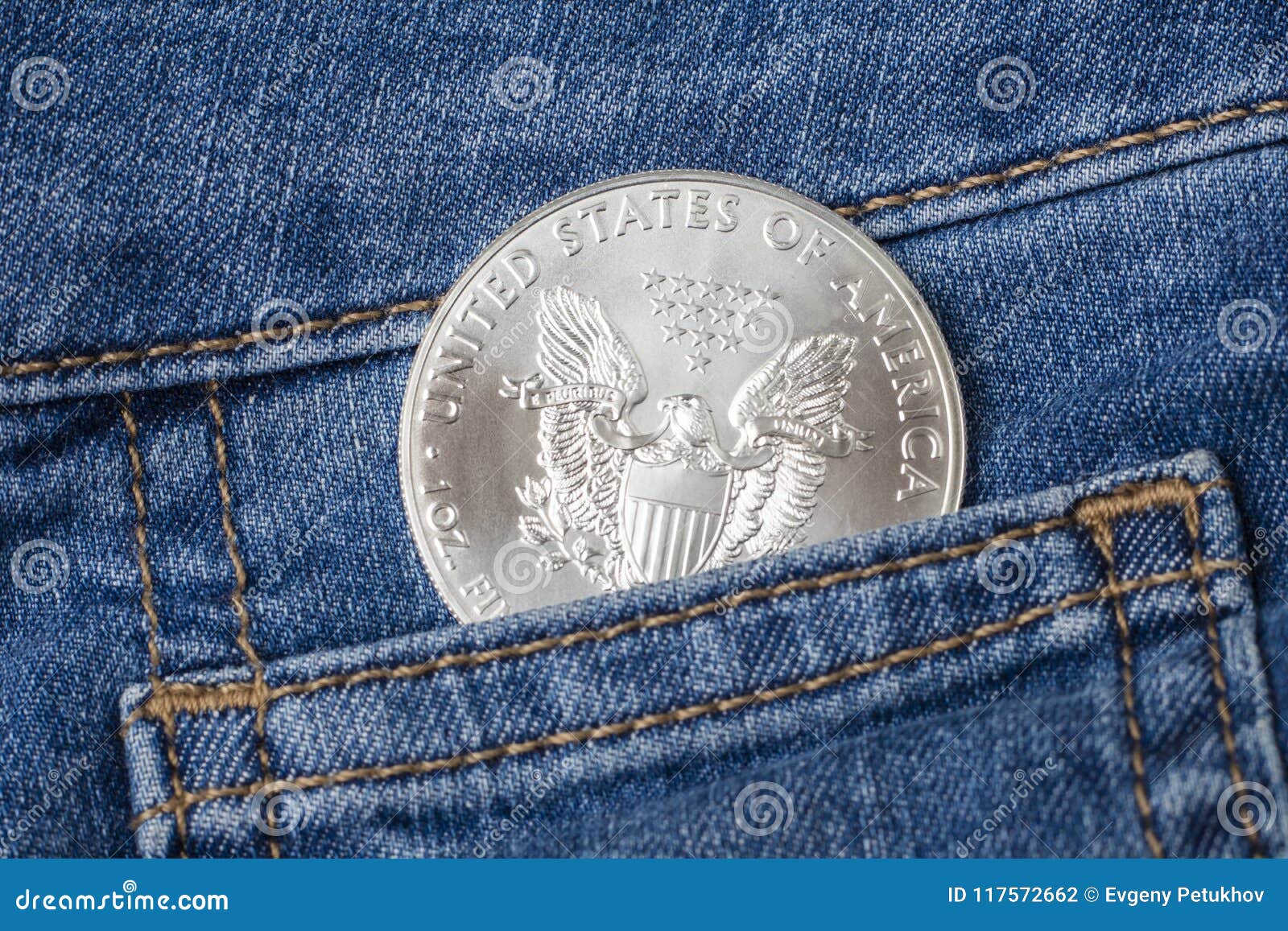 Silver Eagle Coin in Your Jeans Pocket Stock Photo - Image of finance ...