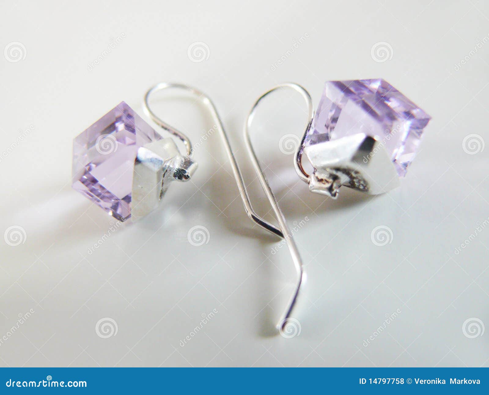 silver earrings with lila crystal