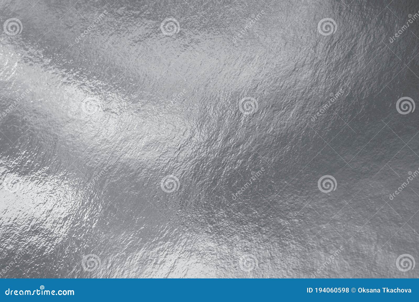 Silver paper background metallic texture wrapping foil sheet shiny