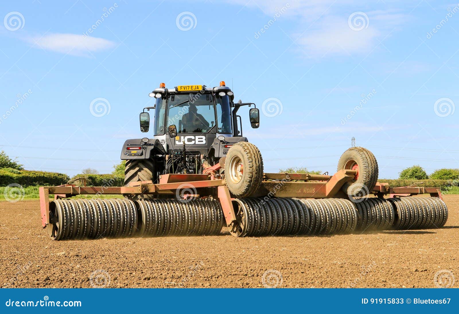 Yellow JCB Fastrac Tractor Parked By Hedge Editorial Photo