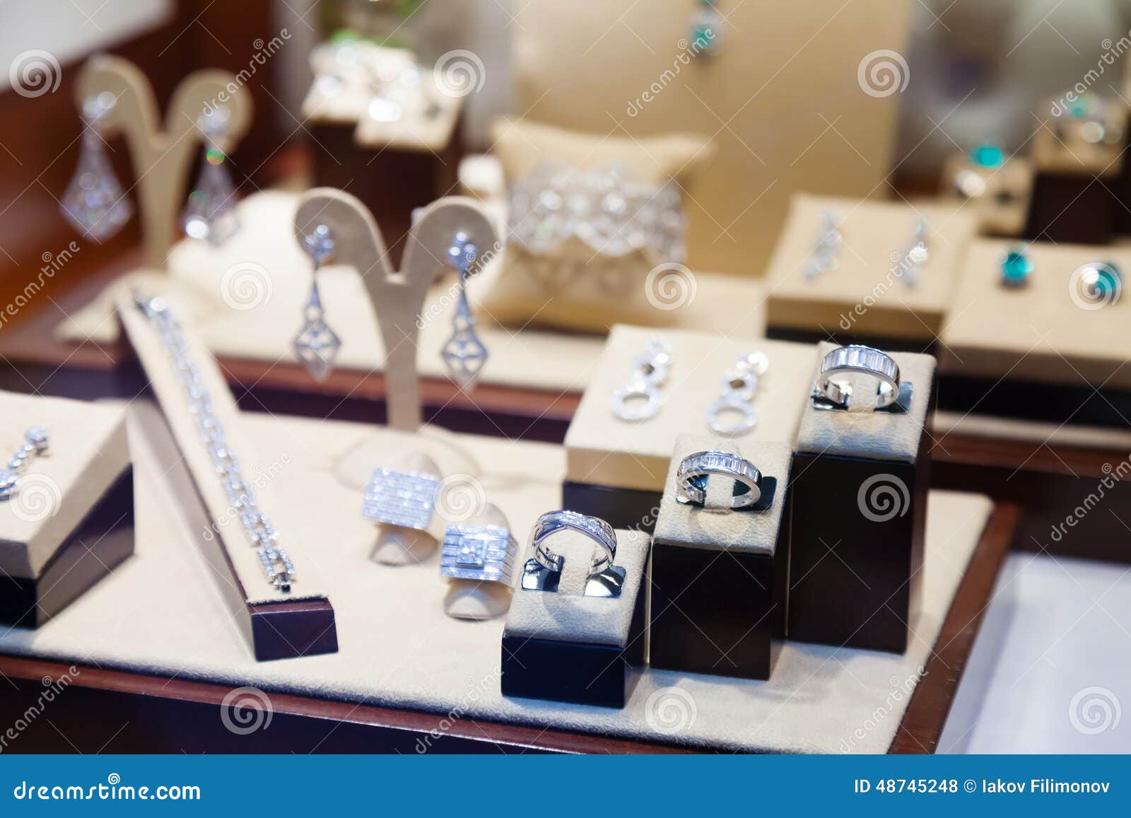 Silver jewelry at showcase stock photo. Image of gems 48745248