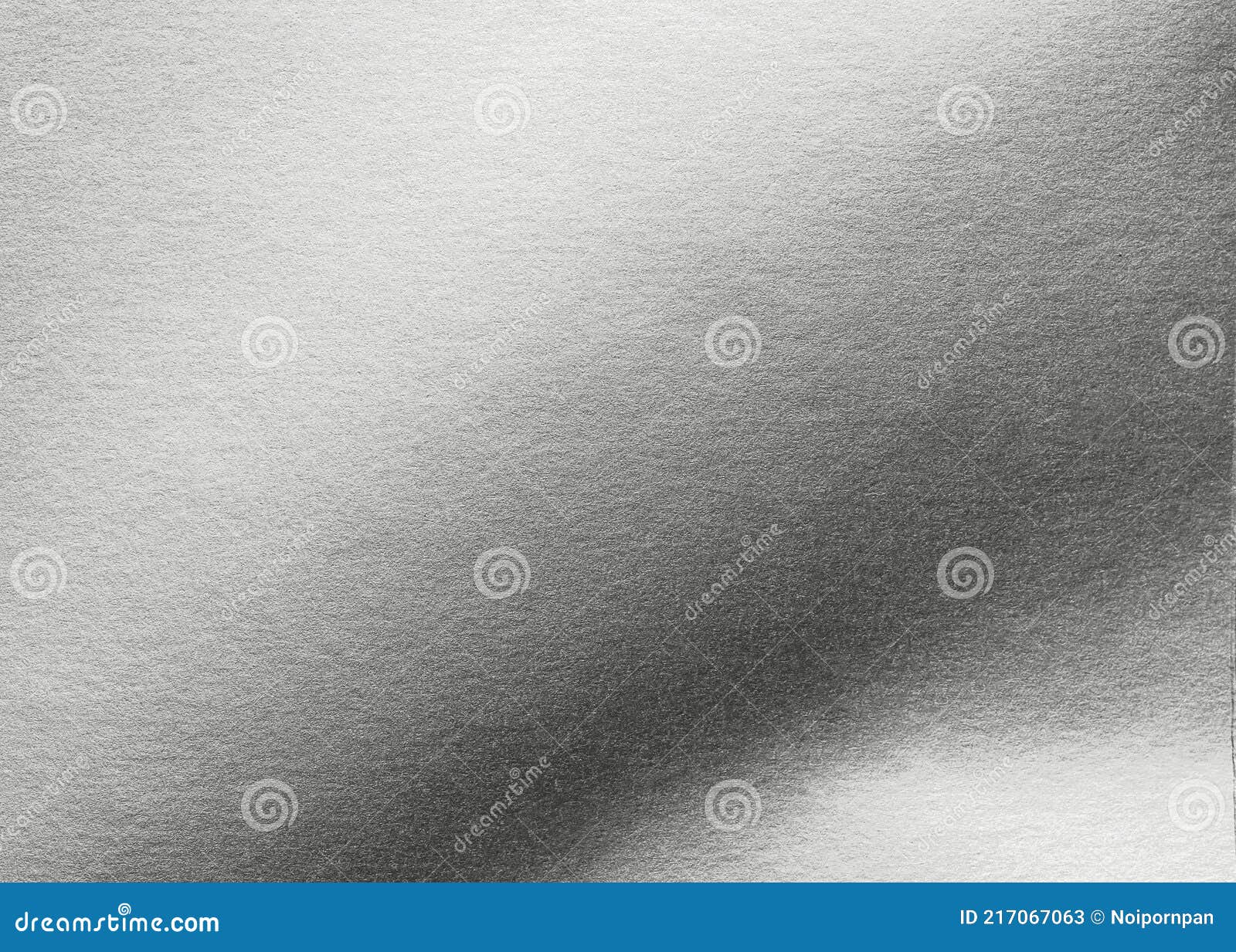 Silver paper background metallic texture wrapping foil sheet shiny white  grey metal backdrop for wallpaper decoration element Stock Photo