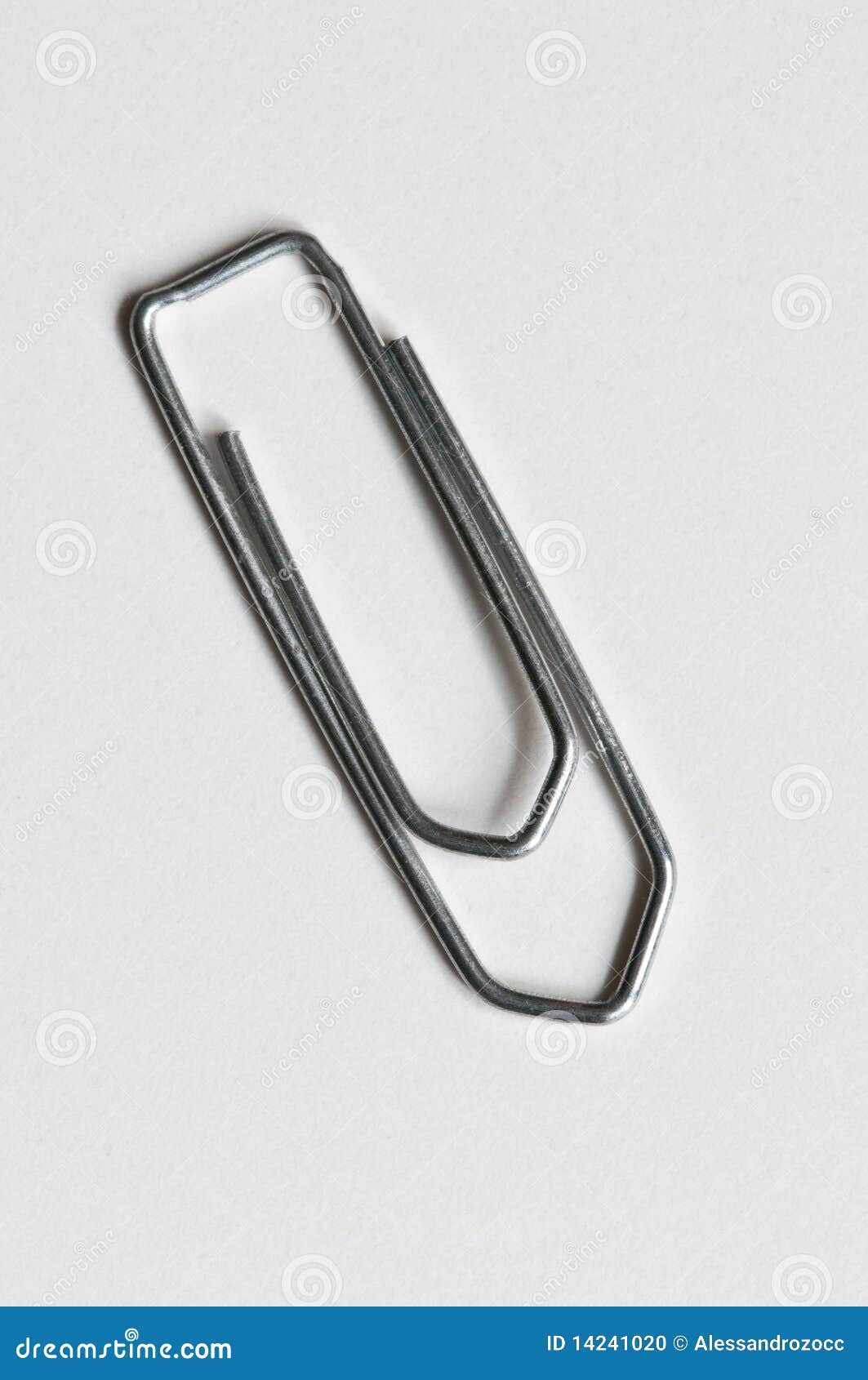Silver paperclip stock photo. Image of closeup, front 14241020