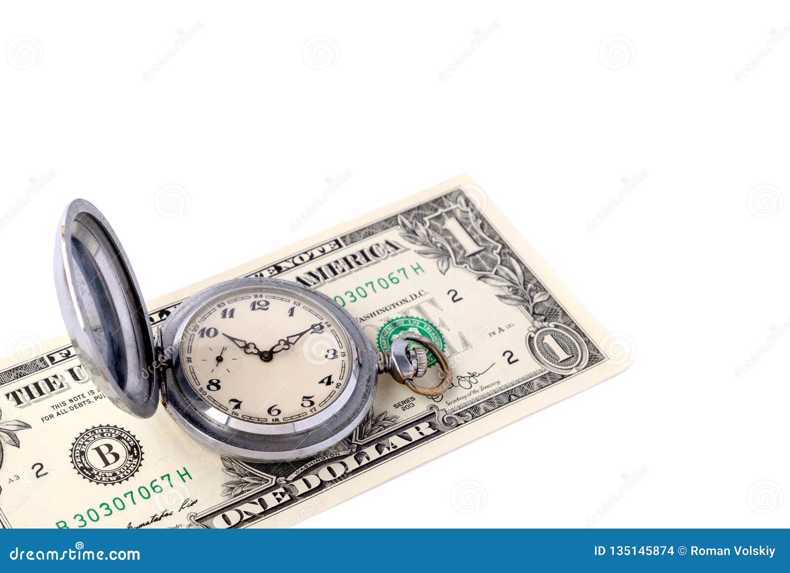 silver retro pocket watches lie on the banknote of one us dollar. the concept of saving time, profit, effective time management.