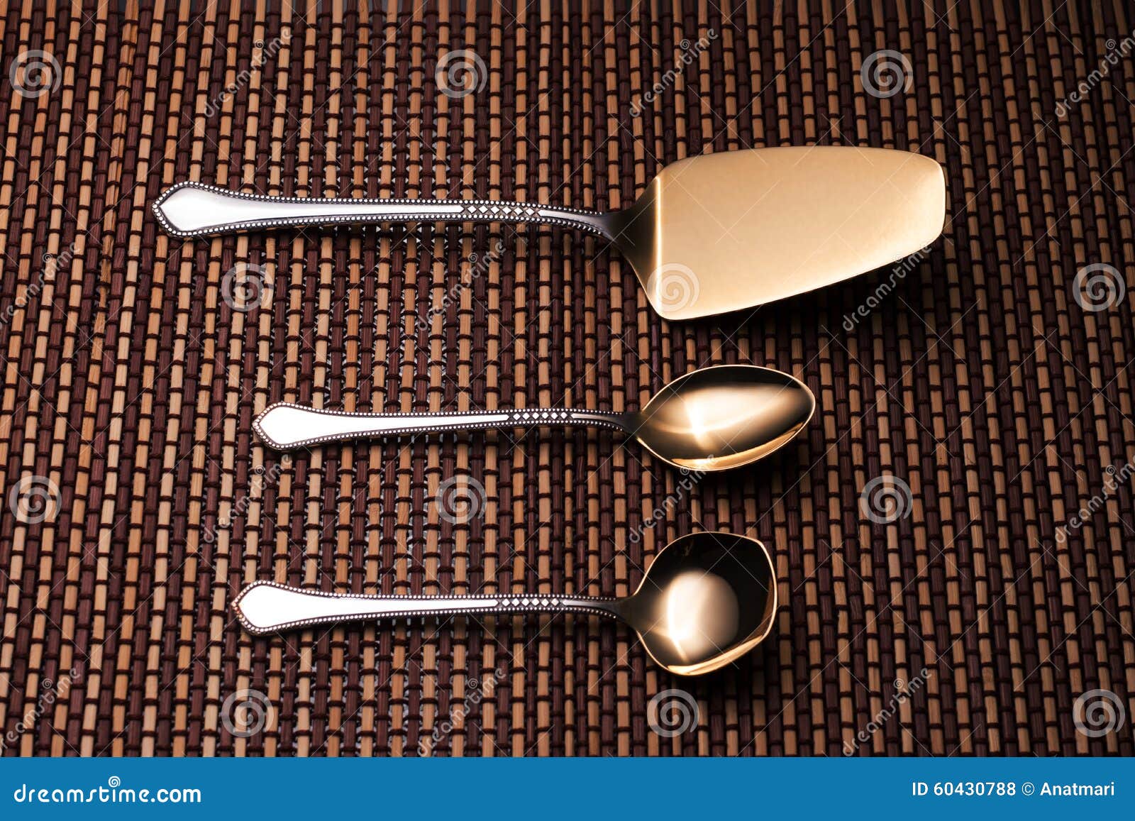 Silver Shovel Cake, Teaspoon and Spoon for Sugar on the Pattern Table