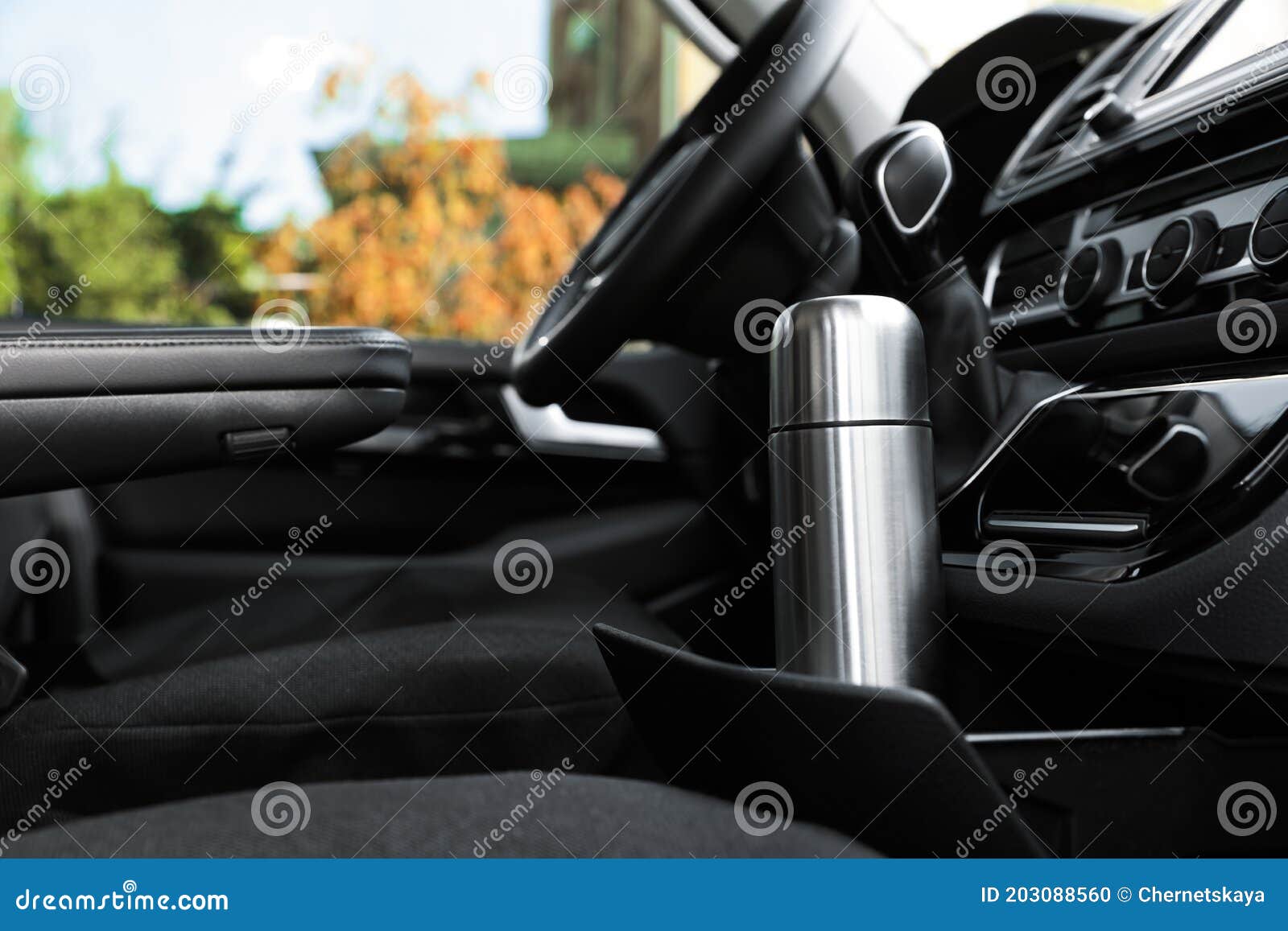 Silver Thermos in Holder Inside of Car Stock Photo Image of roadtrip, beverage 203088560