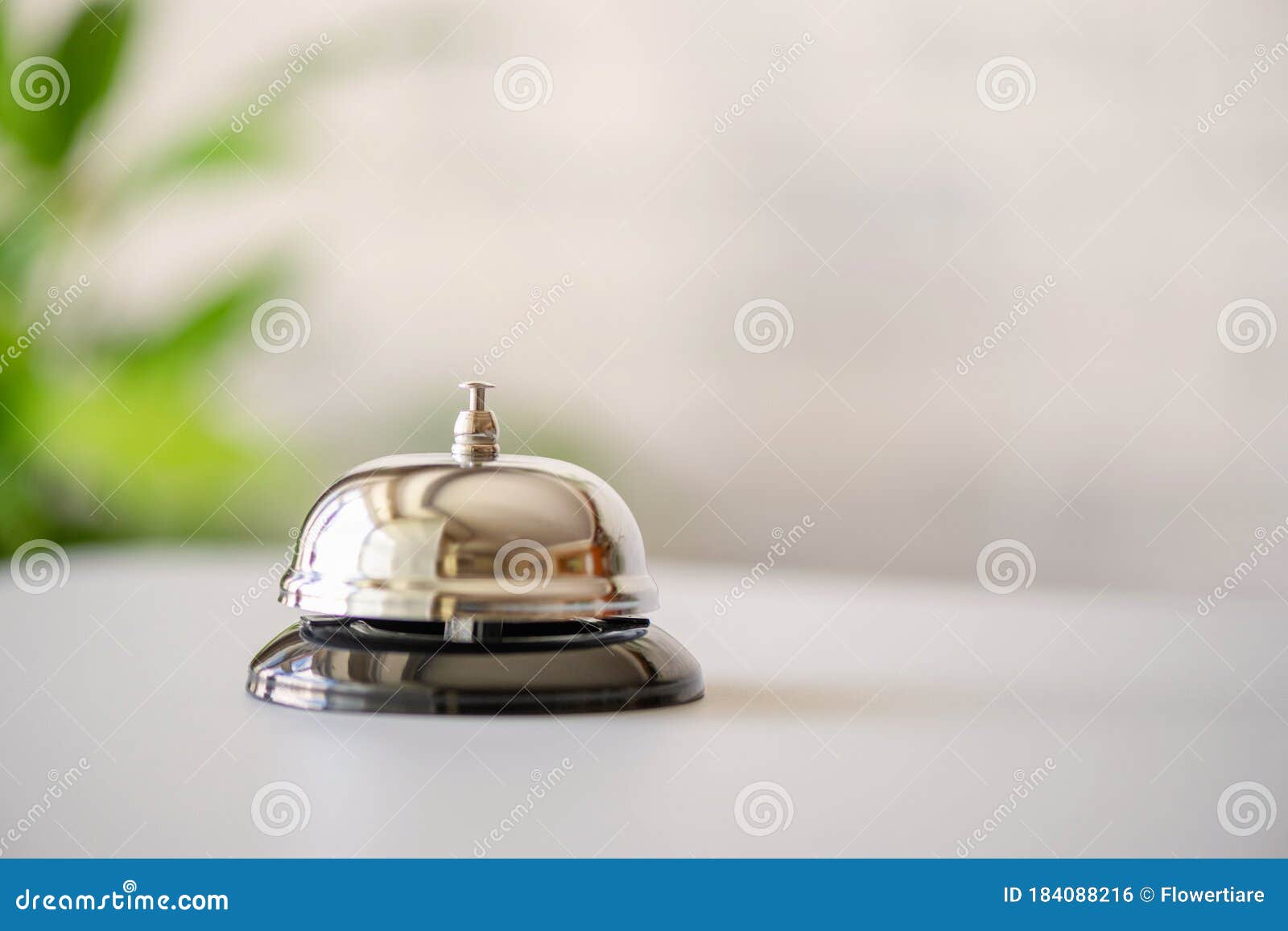 Silver Vintage Bell On Reception Desk With Copy Space. Hotel Service