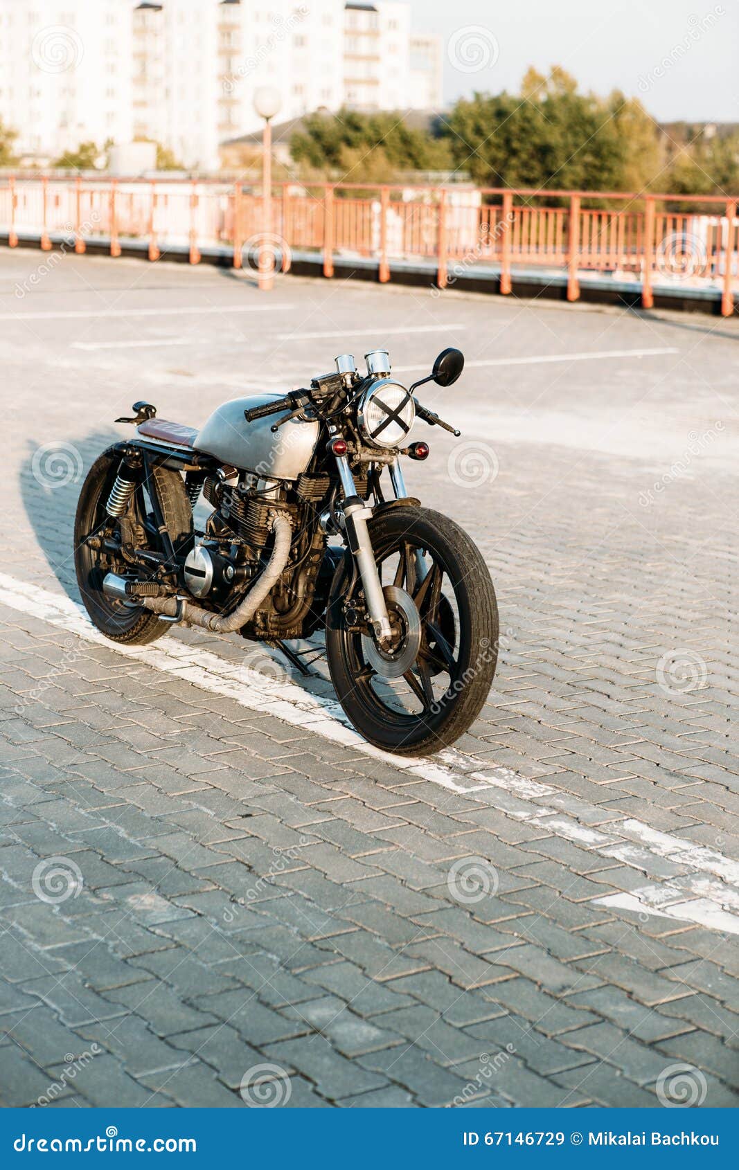 peugeot 103 sp chooper and mbk 51 motobecane caferacer french vintage retro  moped in style custom and racing parked in city street Photos