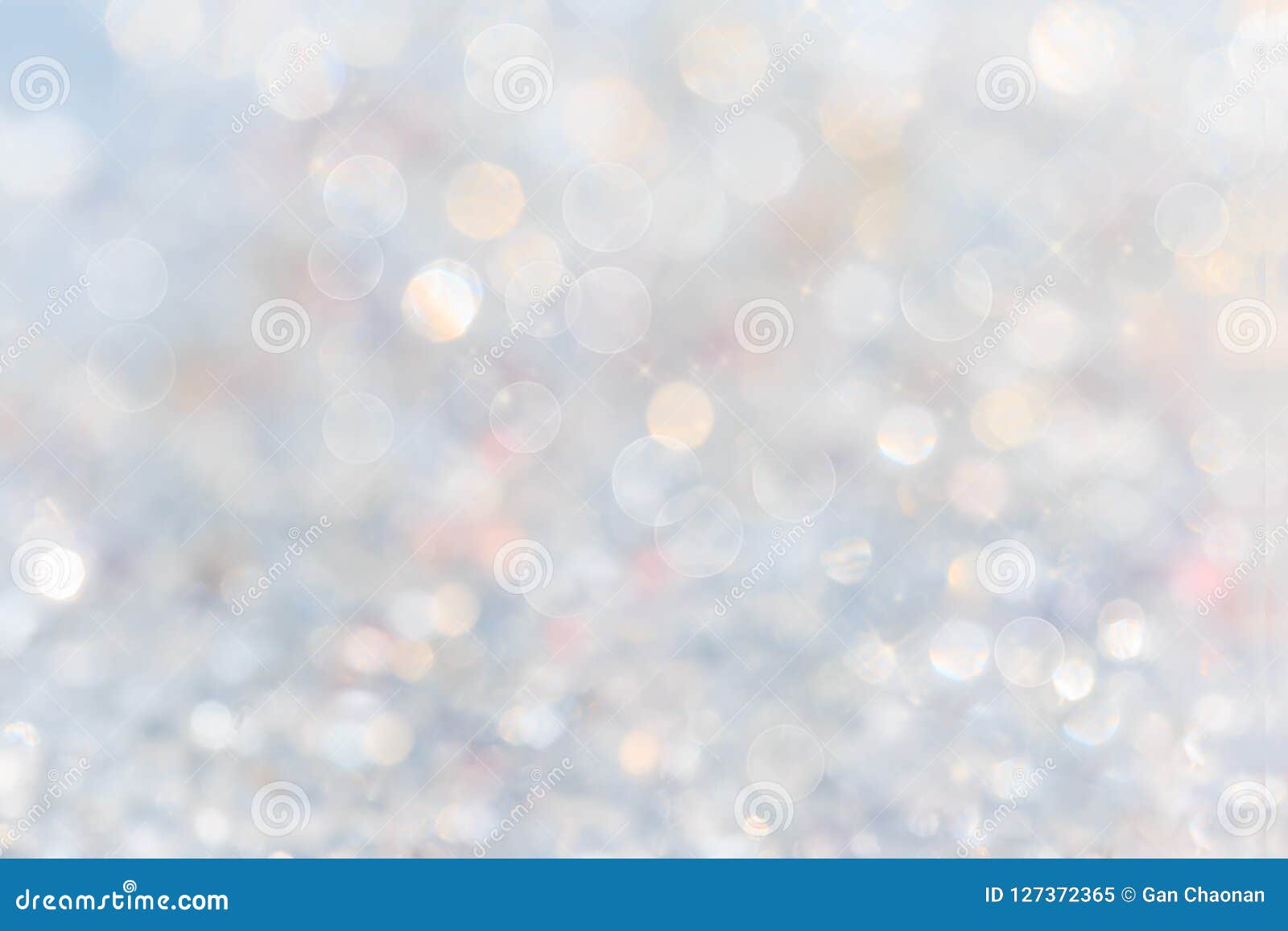 silver and white bokeh lights defocused. abstract background. white blur abstract background.
