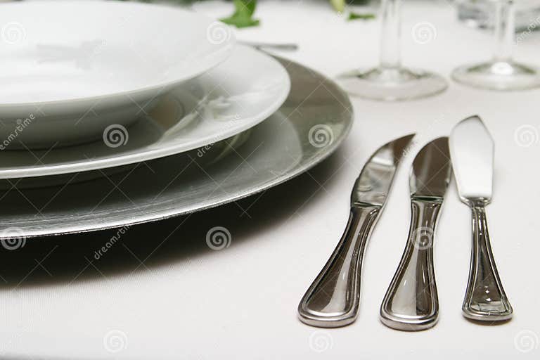 Silverware and crockery stock photo. Image of tablesetting 97422