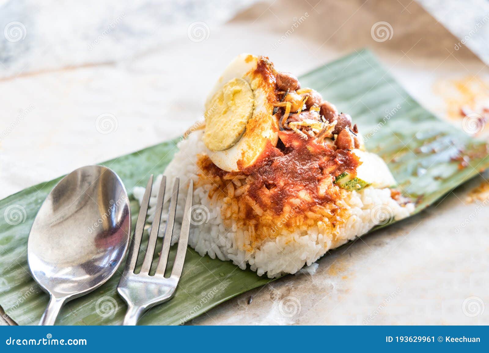 Simple Authentic Nasi Lemak Bungkus Wrapped With Banana Leaf Stock