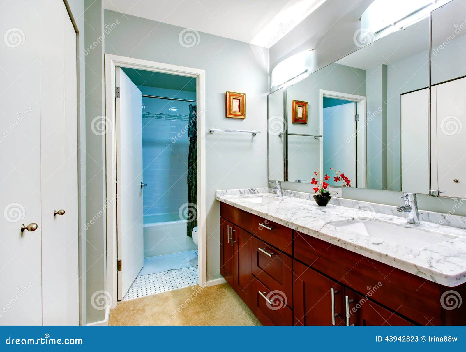 Simple Bathroom Interior with Vanity and Mirror Stock Image