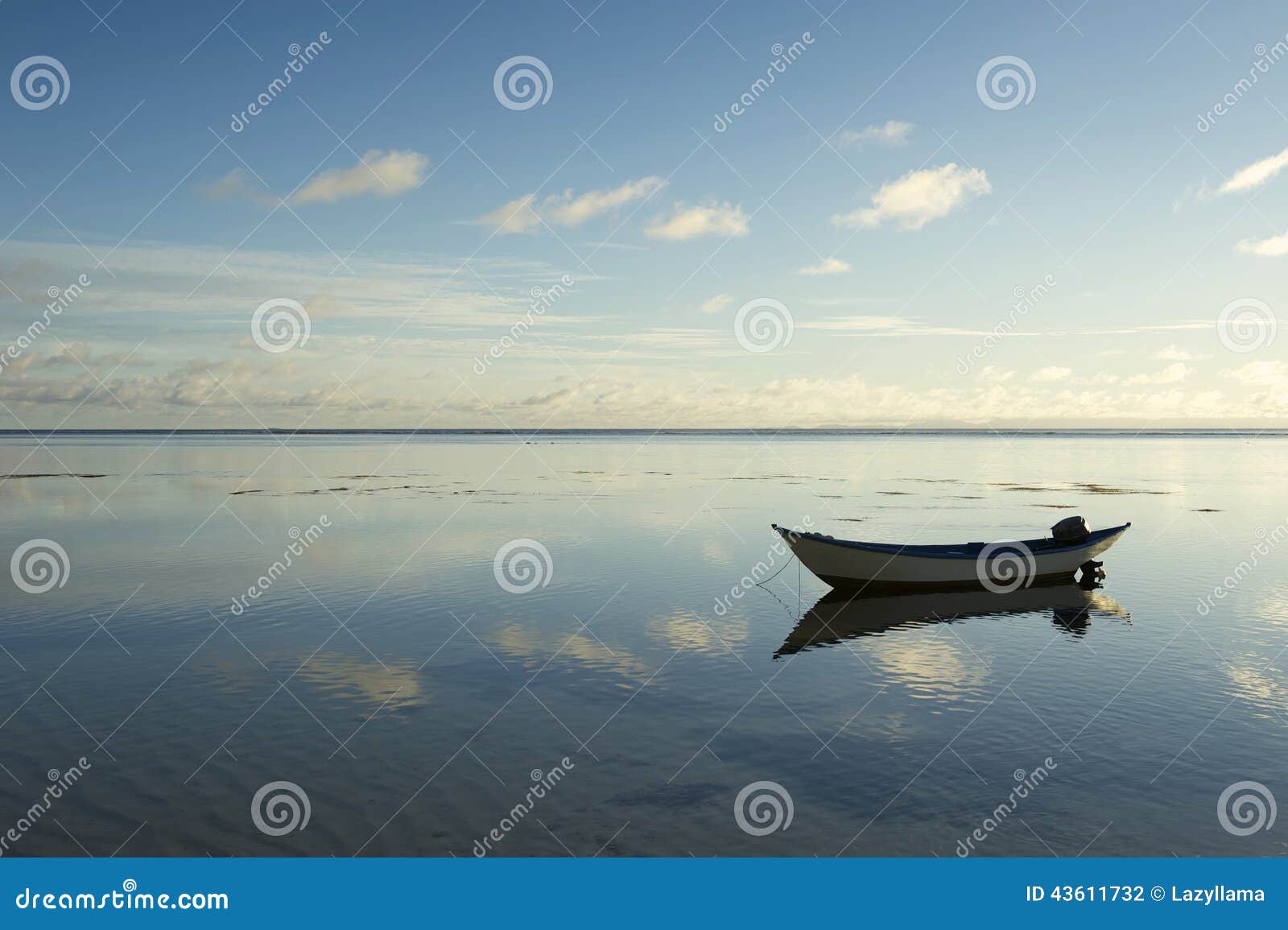 simple boat floating in calm water