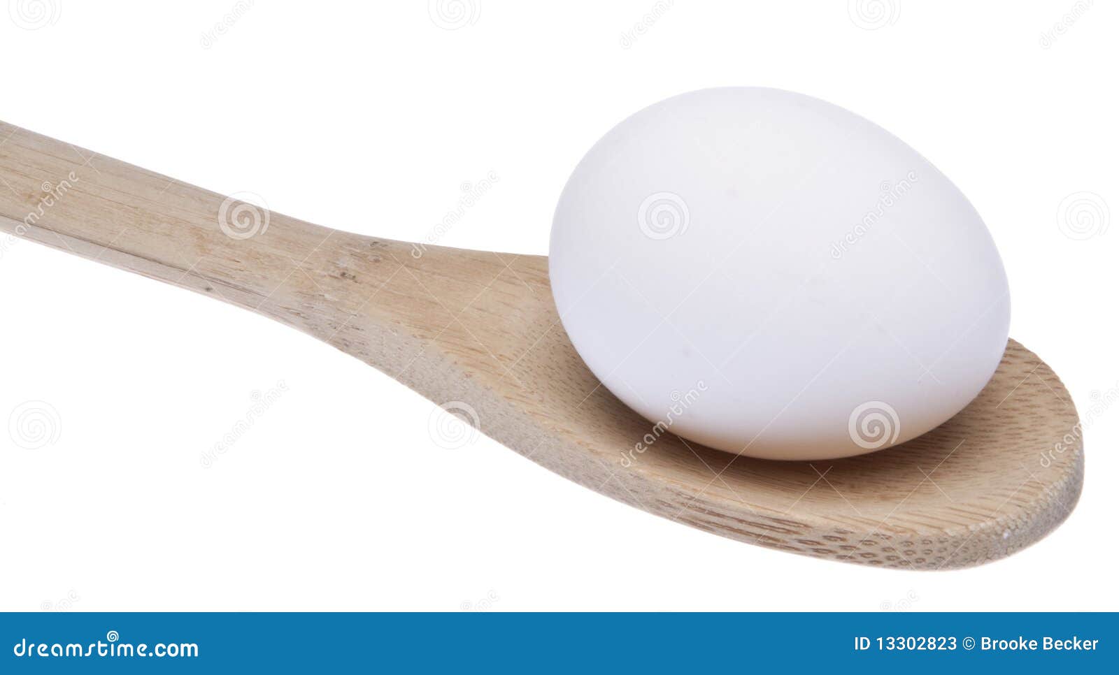 Simple Egg in Wooden Spoon stock image. Image of eating 13302823