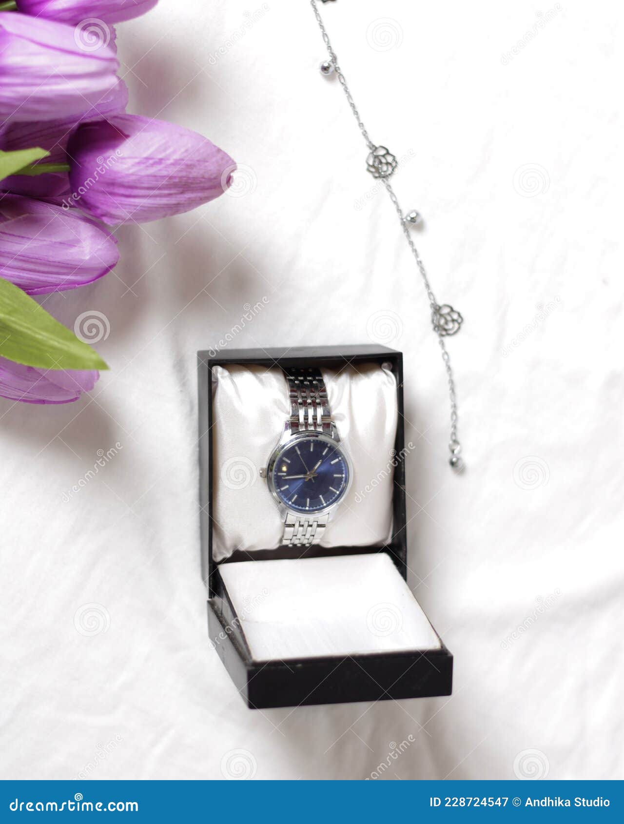 simple and elegant watch with a soft color.