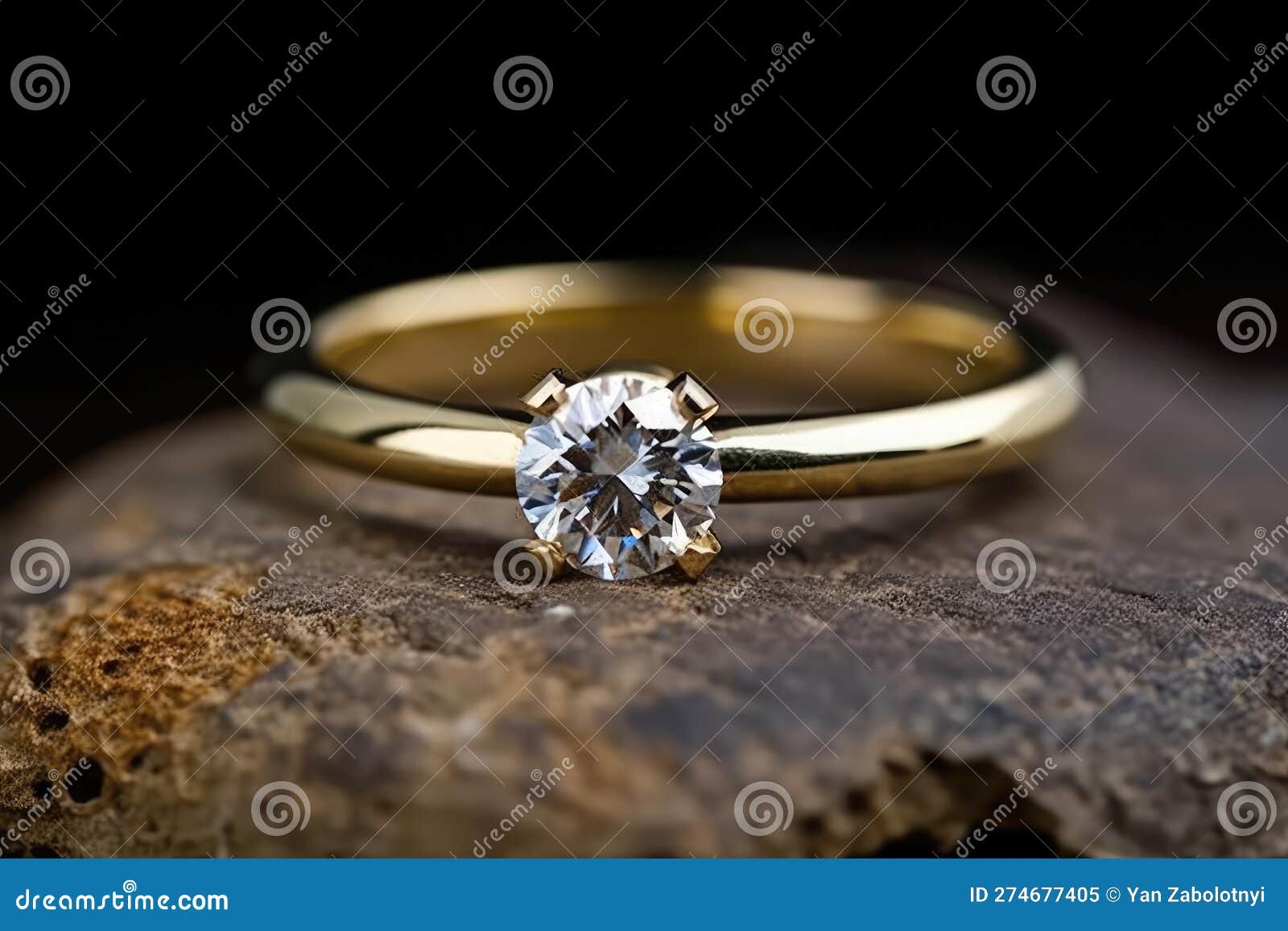 A Simple Gold Band with a Single Diamond in a Classic Setting
