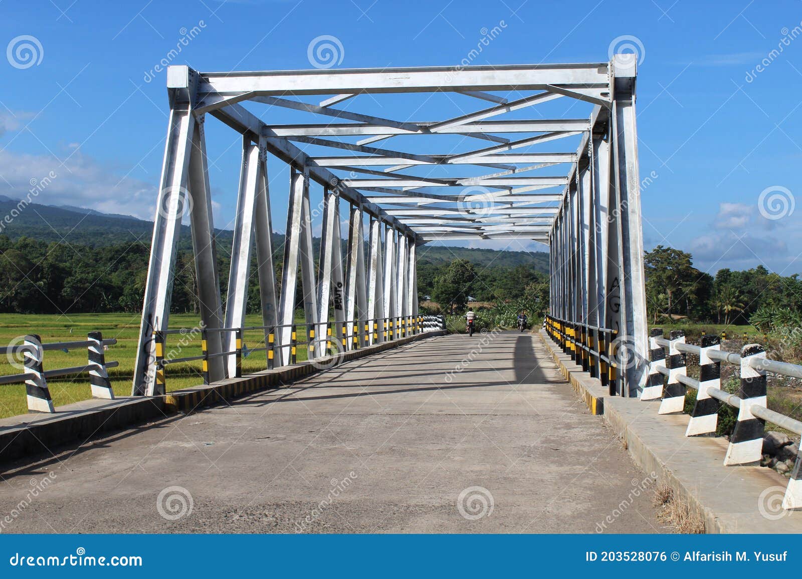 a simple iron bridge thats is often passed by the west satarmese people to carry out their economic activities