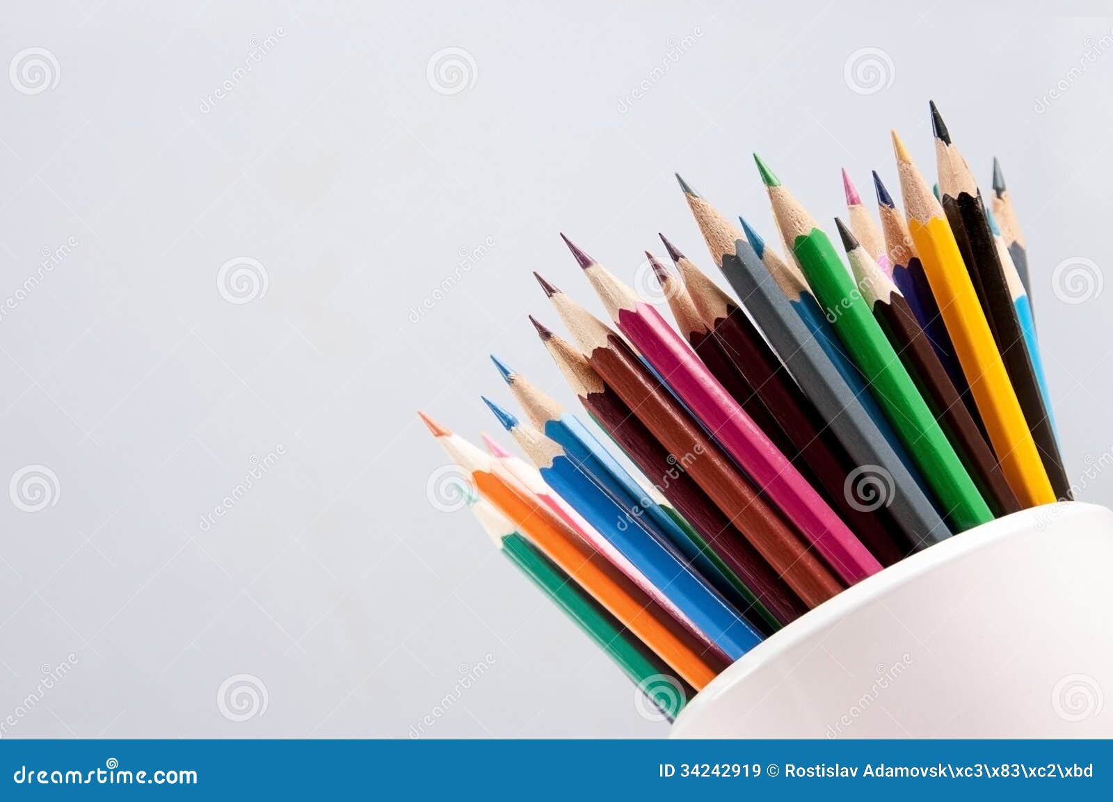Simple Light Background with a Set of Colored Pencils Stock Image