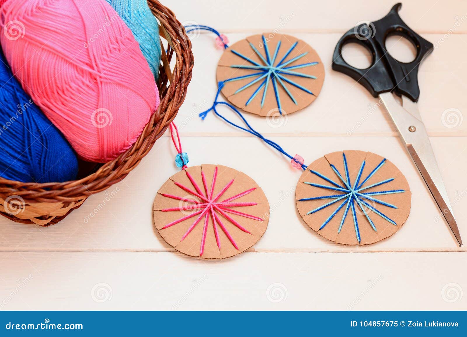 Christmas Balls Decorations, Scissors, Cotton Yarn on a Wooden ...