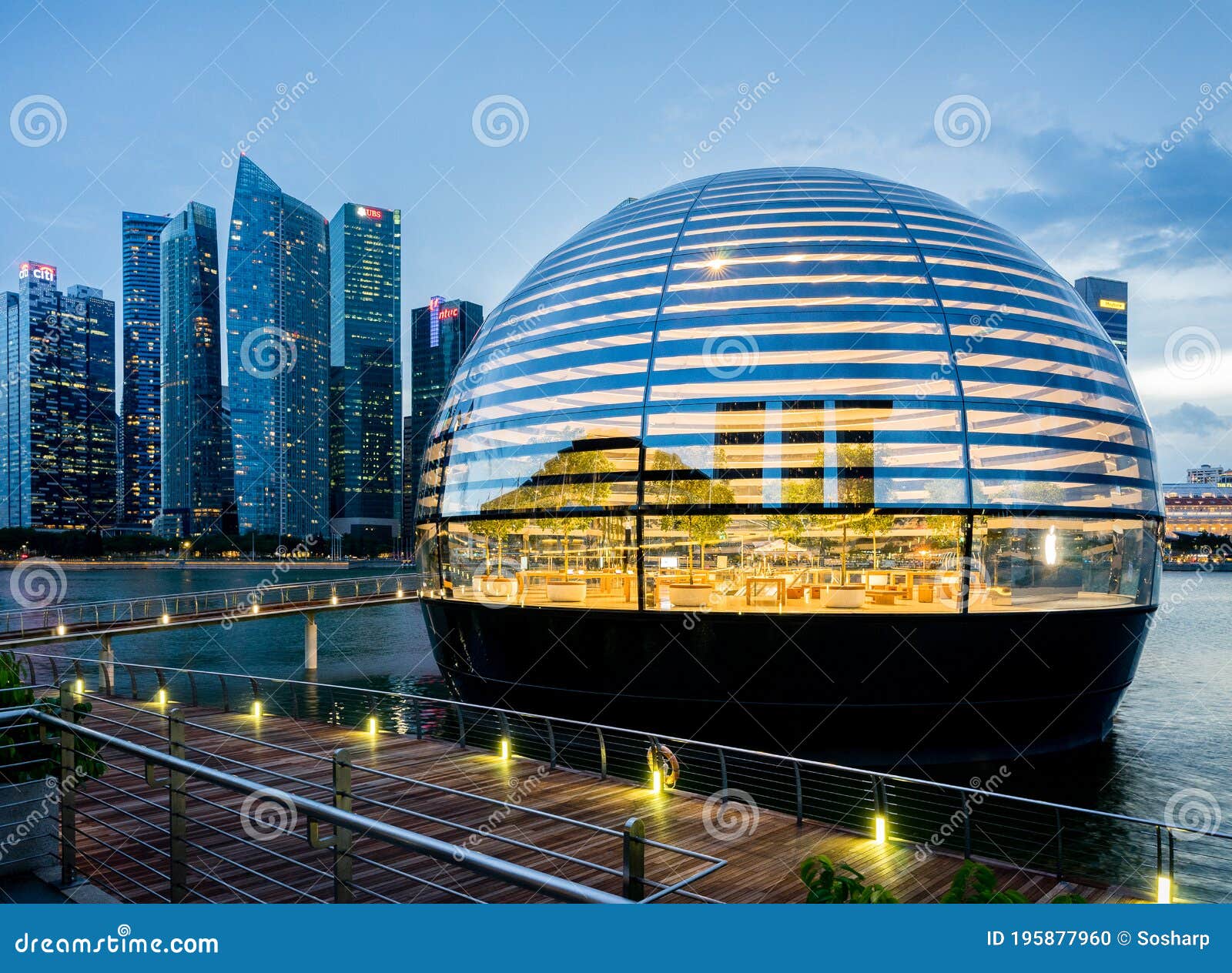 apple unveils floating marina bay sands store in singapore