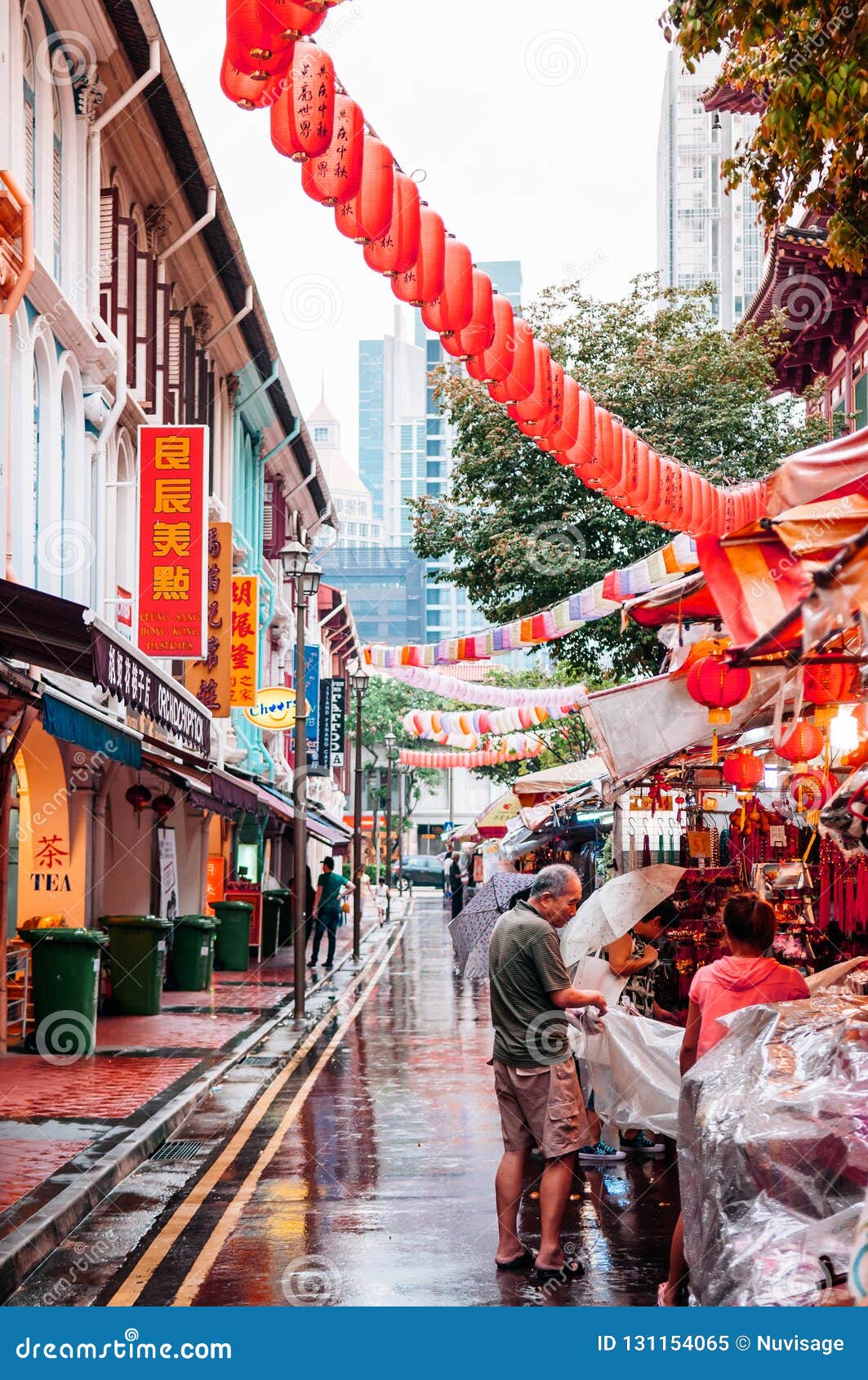 Singapore Street Market with Red Lanterns and Local Asian People