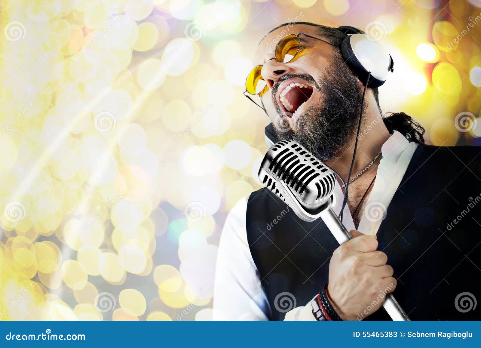 Singer man with microphone stock image. Image of young 55465383