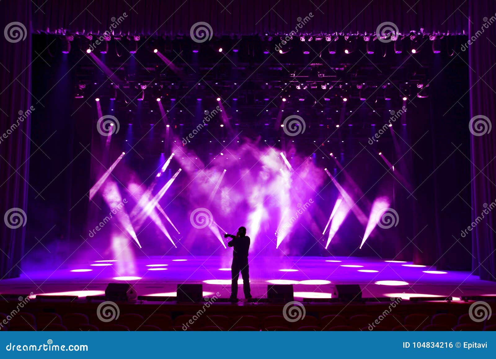 singing man concert stage singing man s silhouette brightly lit show stage against background rays soffits 104834216