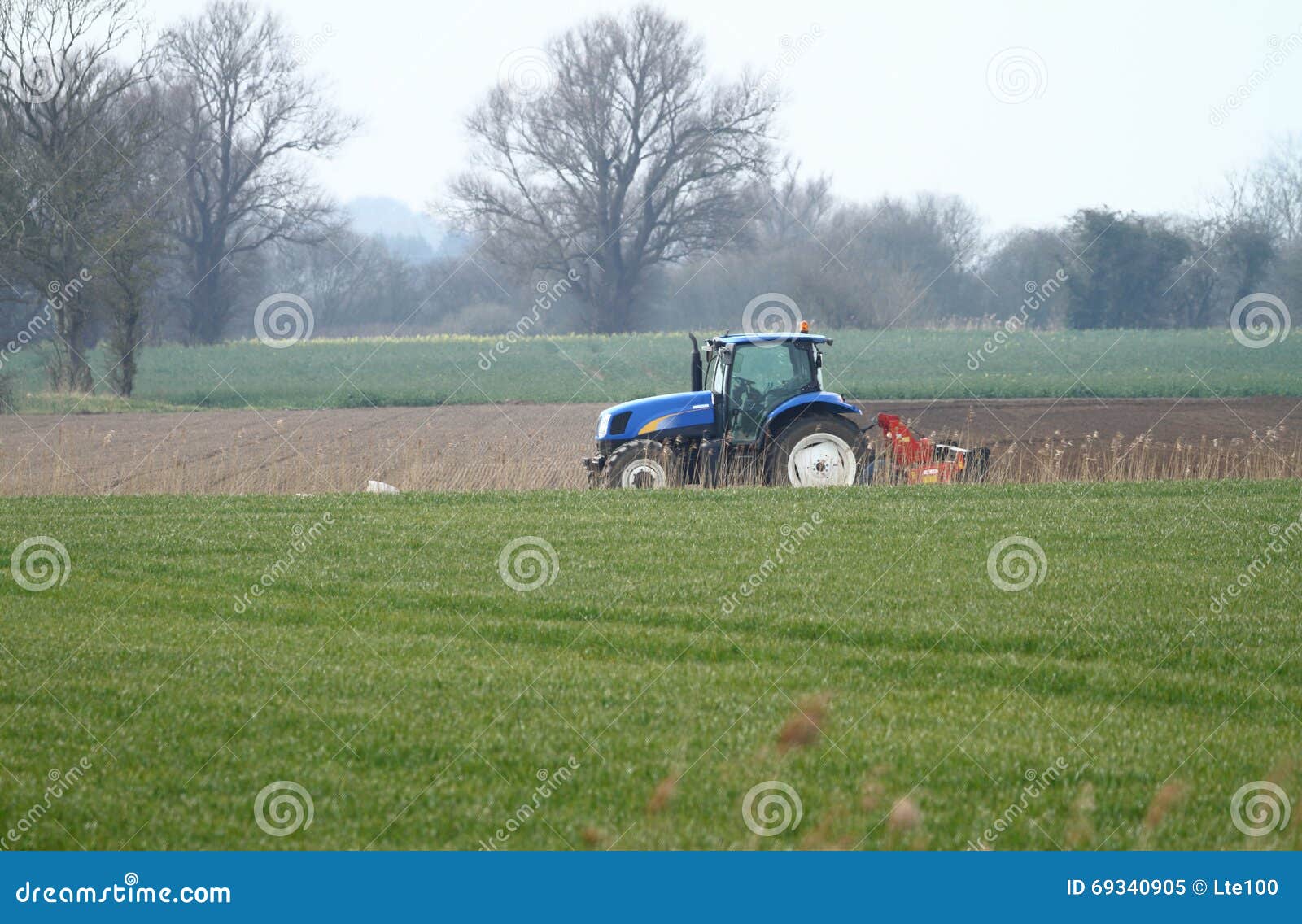 Single blue tractor stock image. Image of machine, blue 69340905
