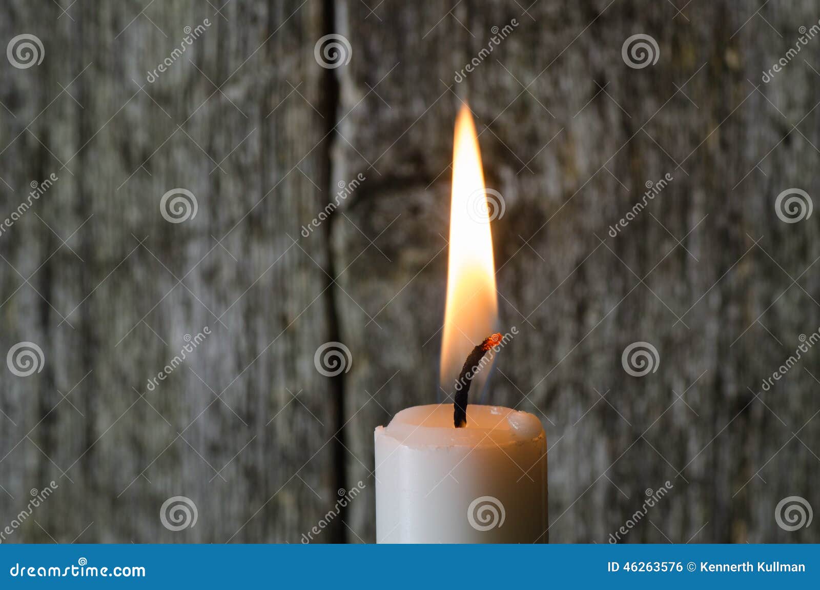 A single burning candle stock photo. Image of burning 46263576