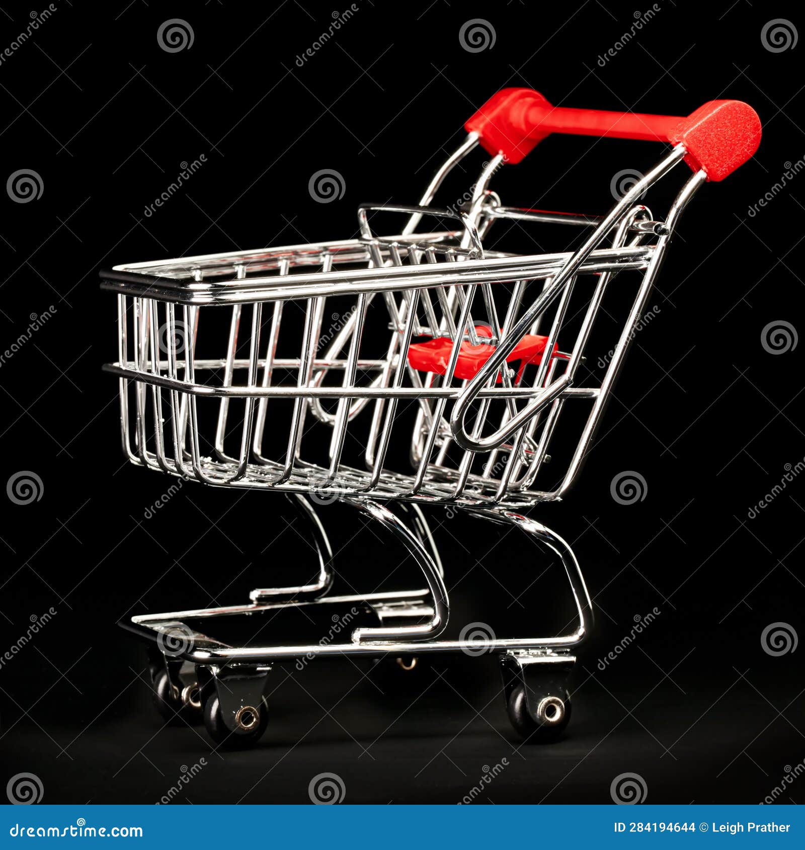 Single Chrome and Red Shopping Cart on Black Stock Photo Image of