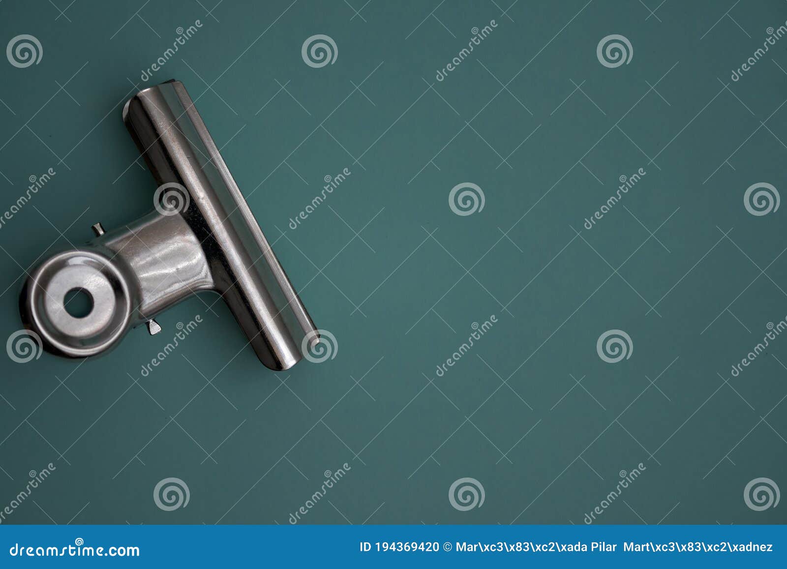 a single clip foldback on a green background