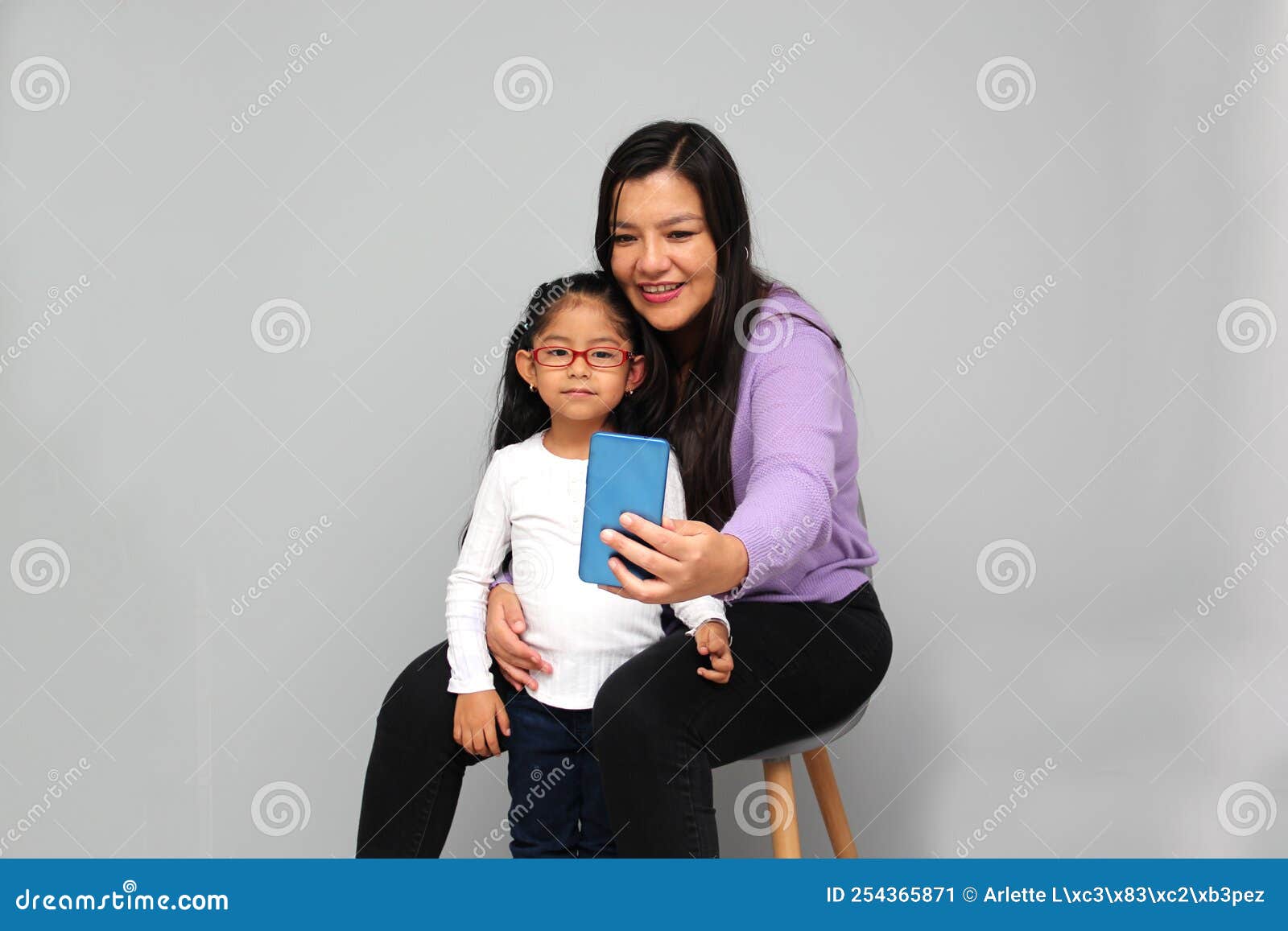 Single Divorced Latina Mom And Daughter Use Cell Phone To Video Call Take Selfies Play Video