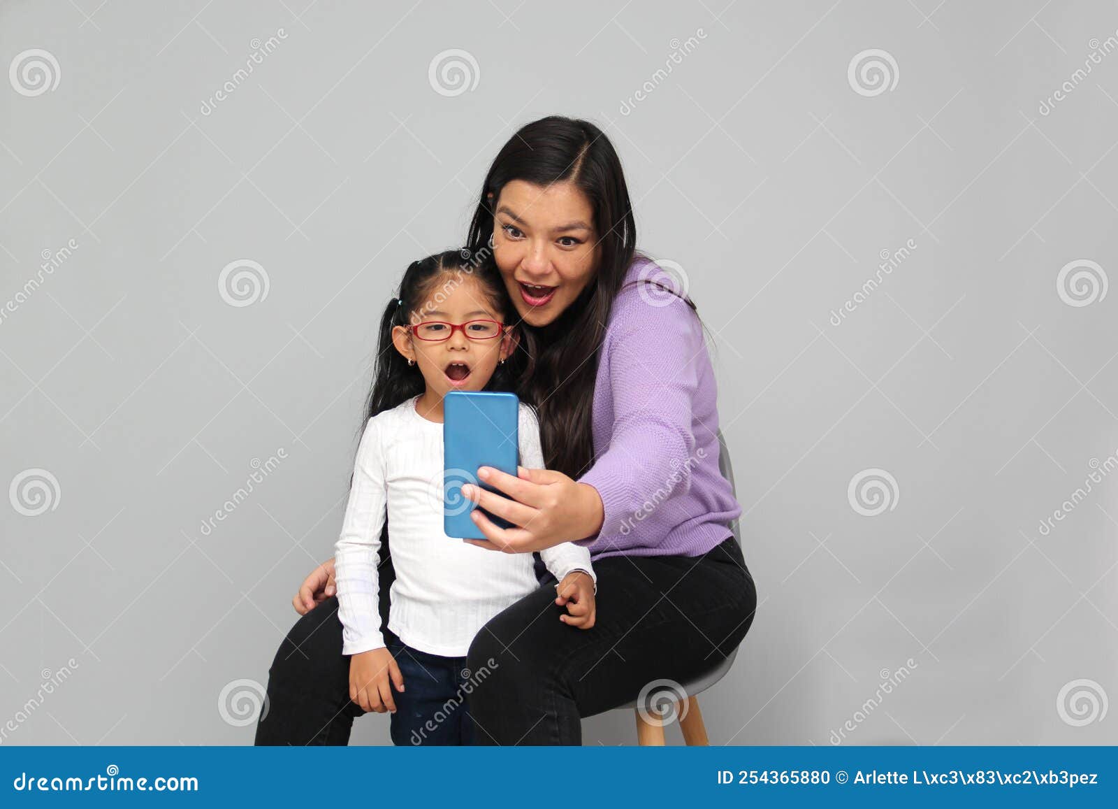 Single Divorced Latina Mom And Daughter Use Cell Phone To Video Call Take Selfies Play Video