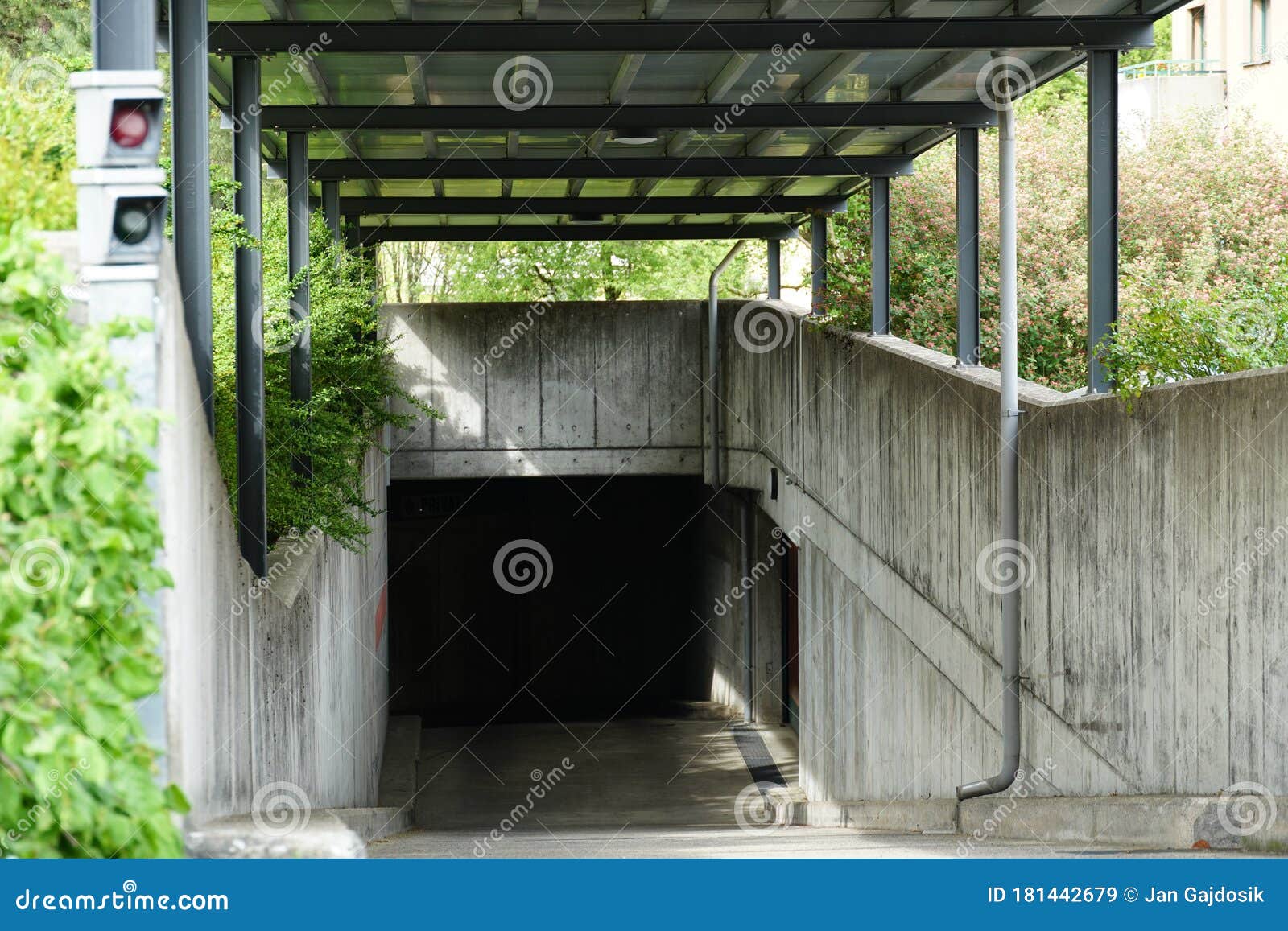 A Single Lane Entrance And Exit Of An Underground Garage 
