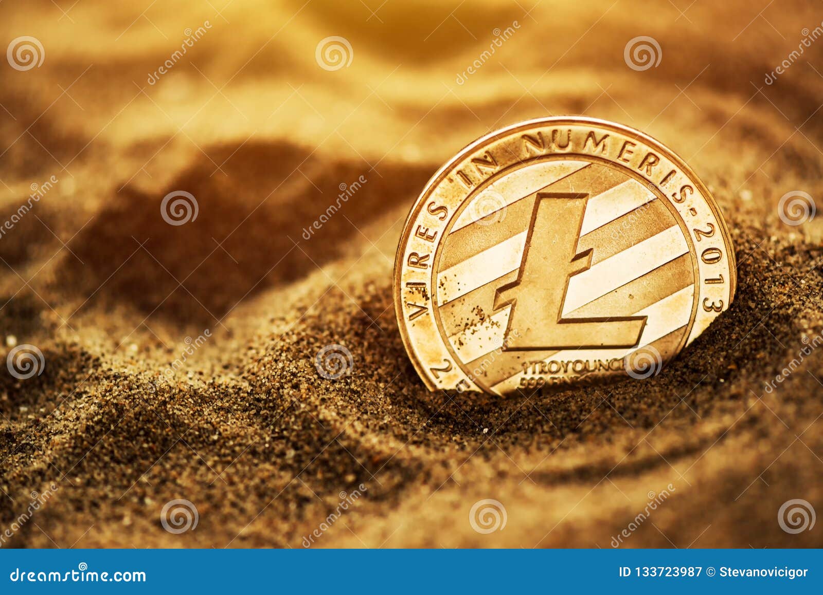 Single litecoin in sand stock image. Image of nobody ...