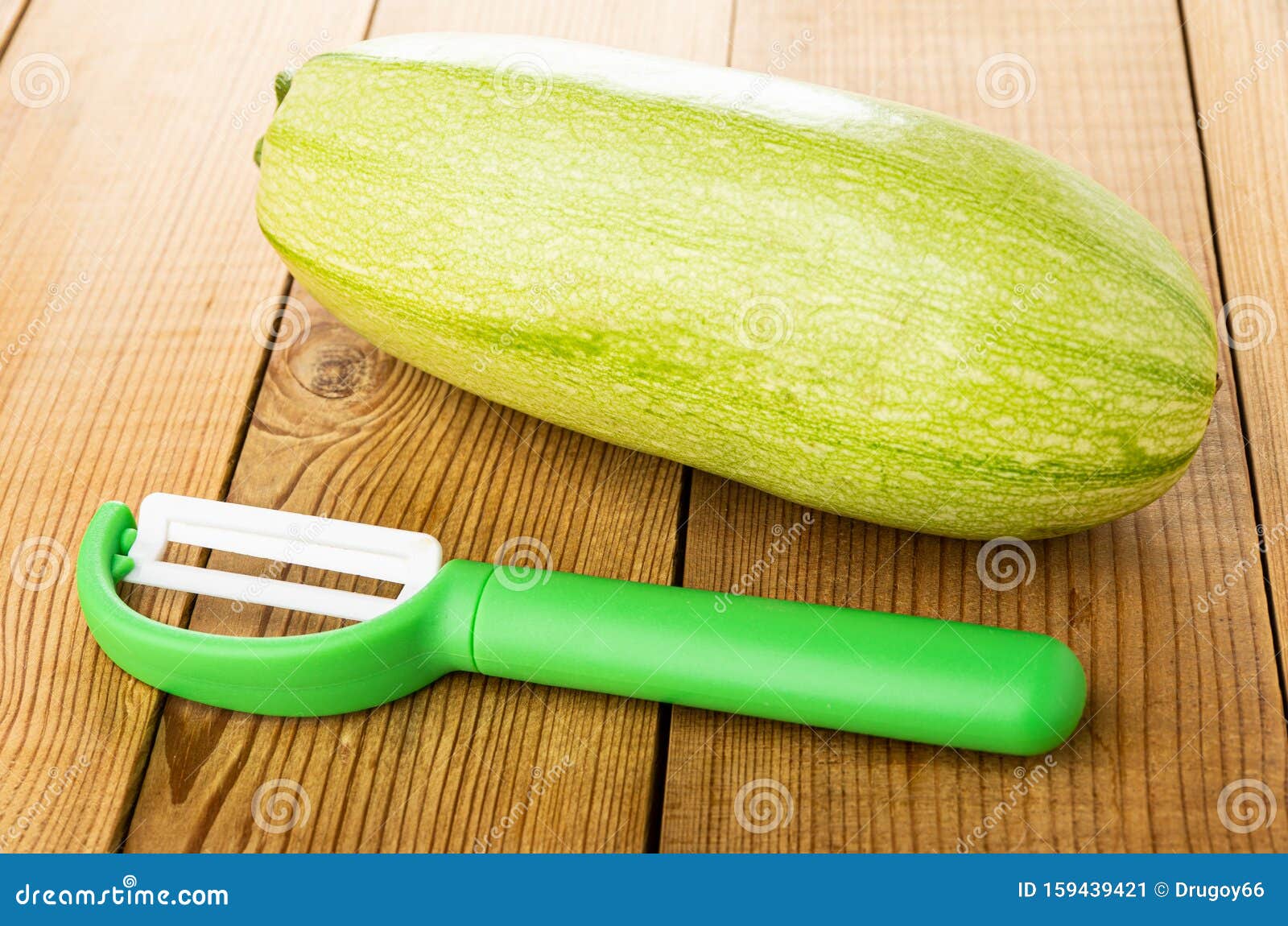 Single Marrow Squash, Peeler on Table Stock Image - Image of food, squash:  159439421