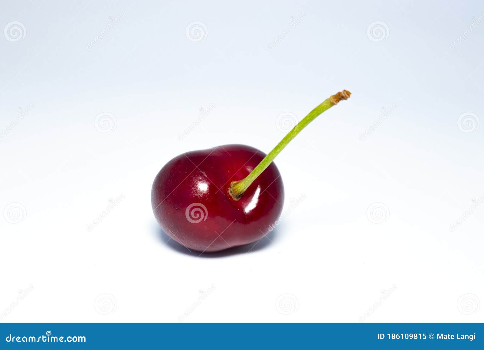 Single Red Cherry with Green Stem Stock Image - Image of single ...