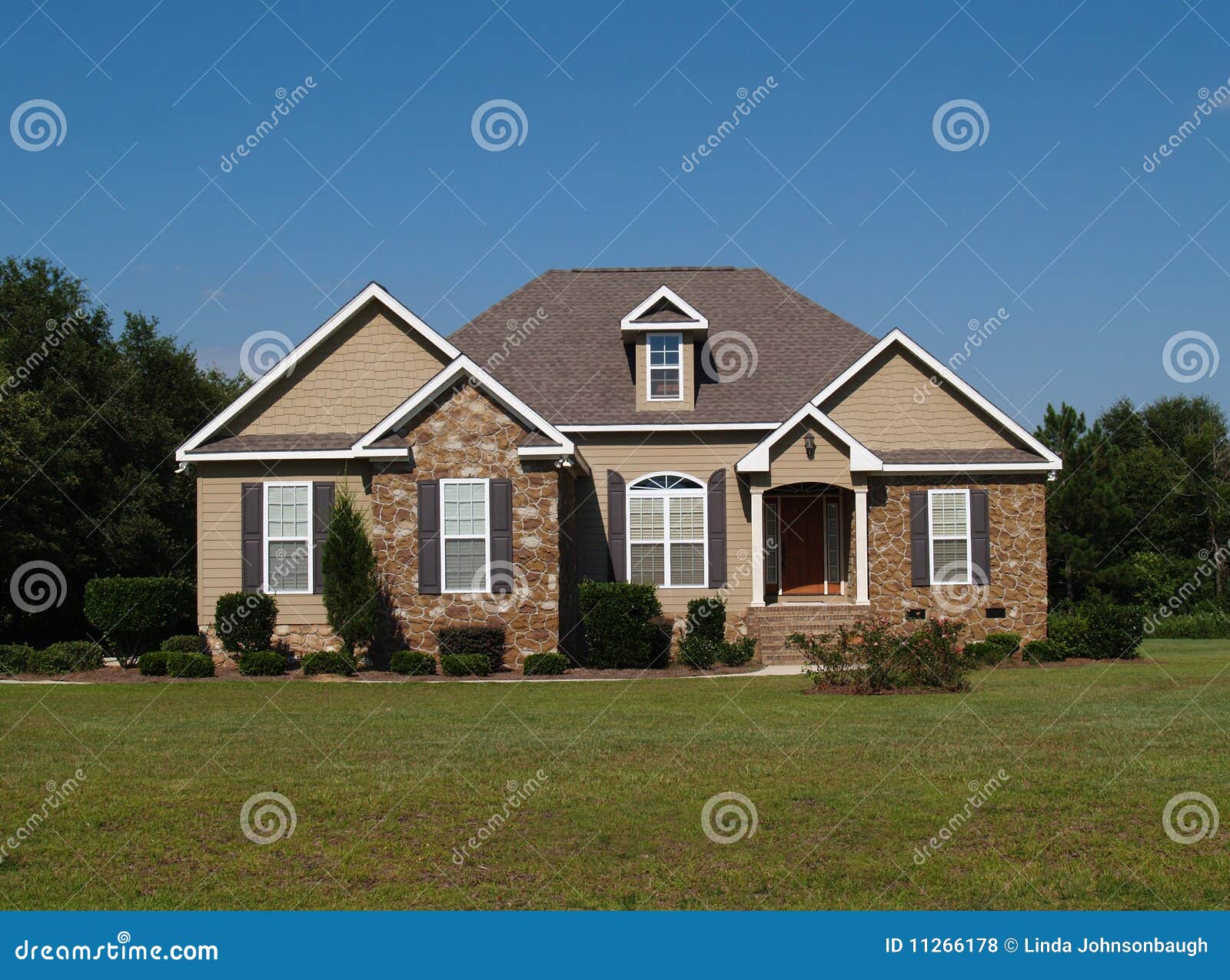 single story stone and vinyl residential home