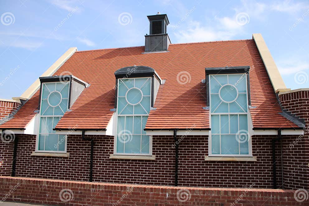 Single Story Vintage Hall Building with Large Decorative Window Panes