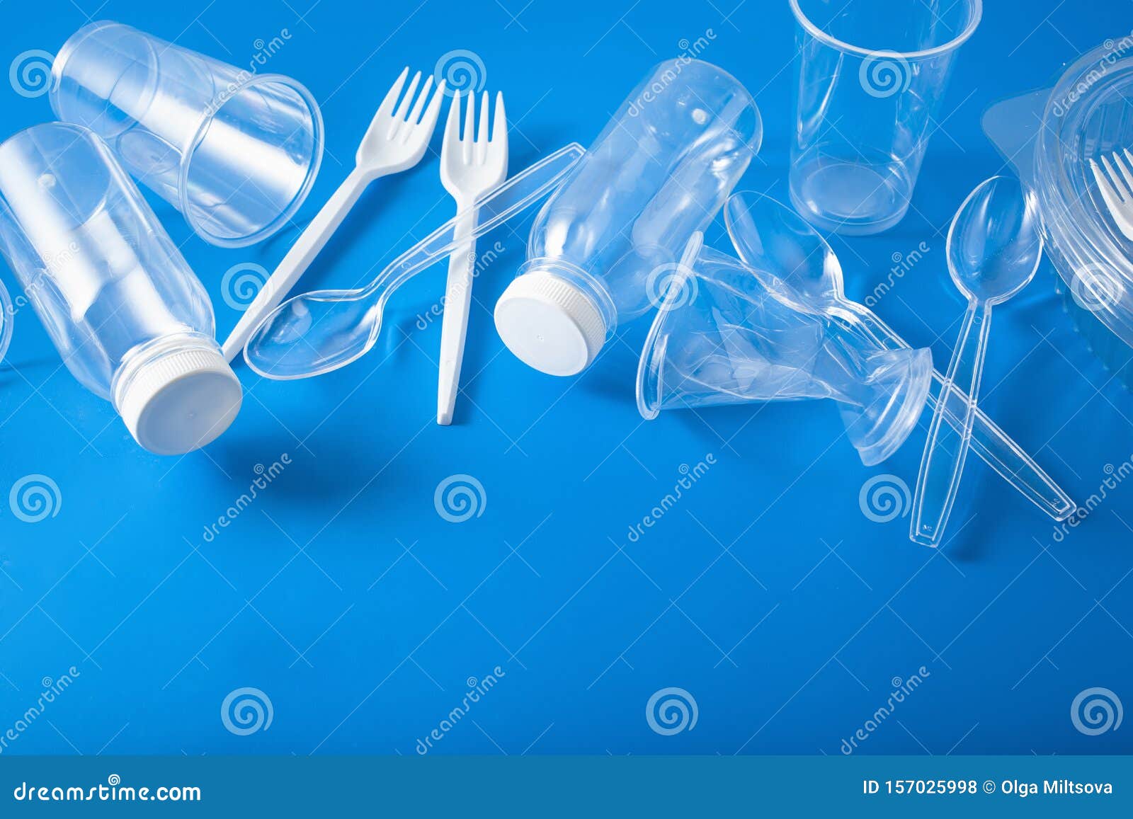 Single Use Plastic Bottles, Cups, Forks, Spoons. Concept of Recycling