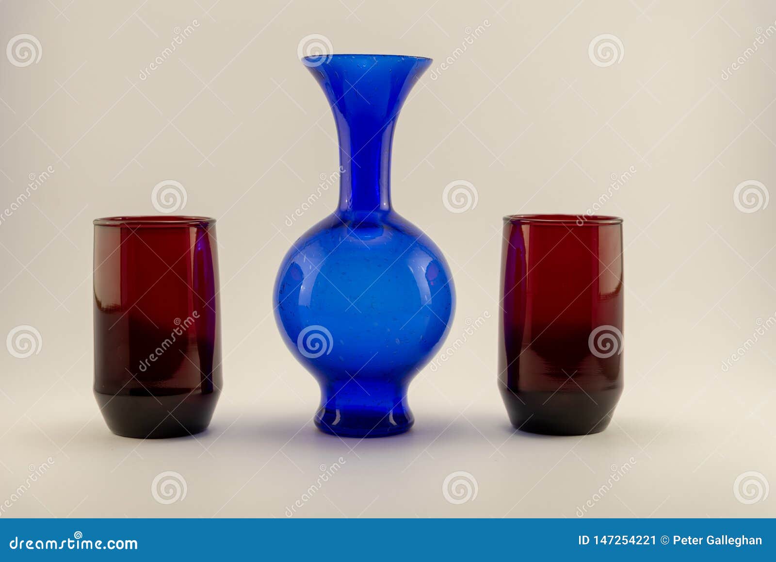Single Vintage Blue Vase and Two Red Candle Holders Stock Image Image
