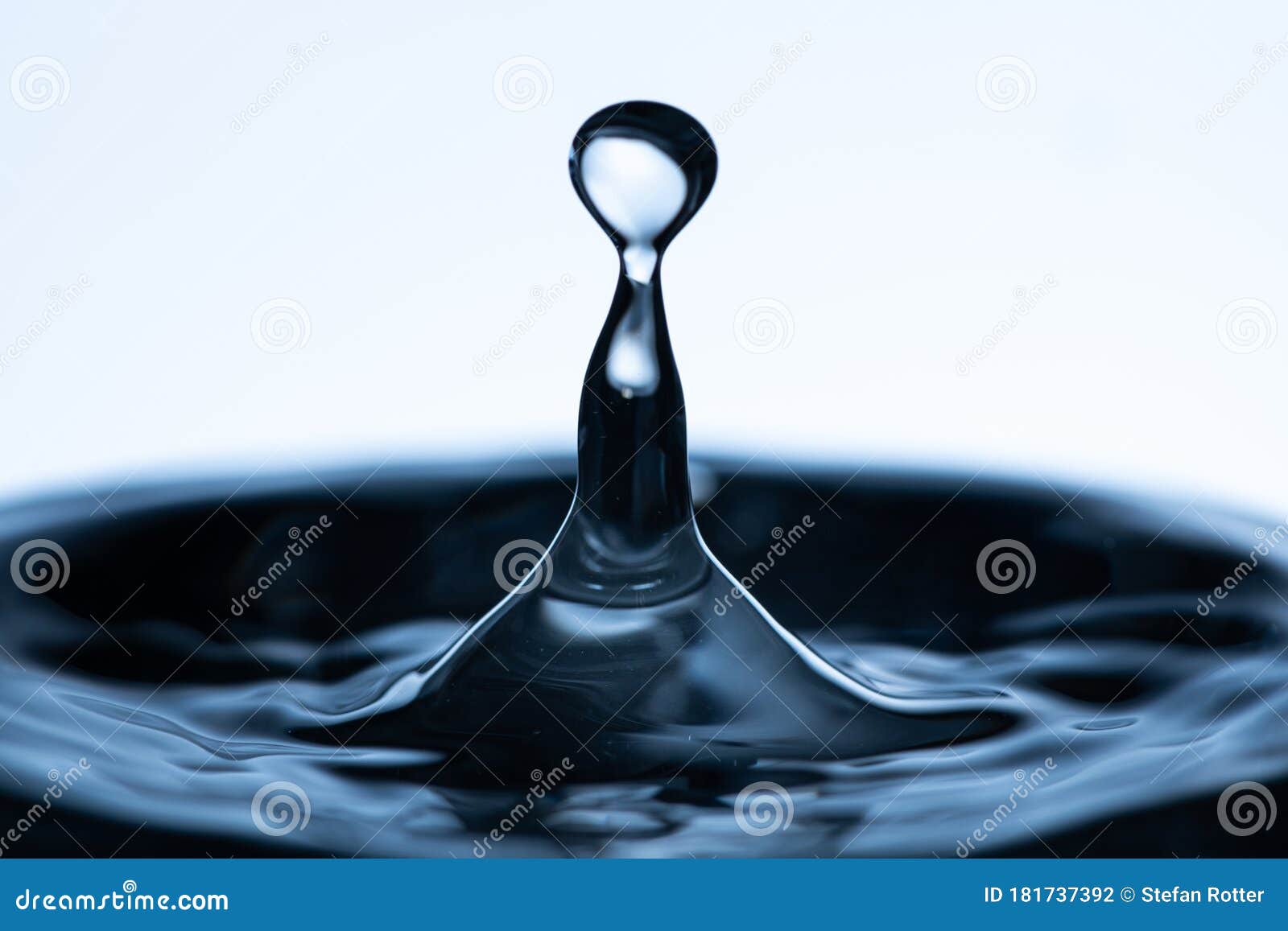 A Single Water Droplet Hitting the Surface Stock Photo Image of
