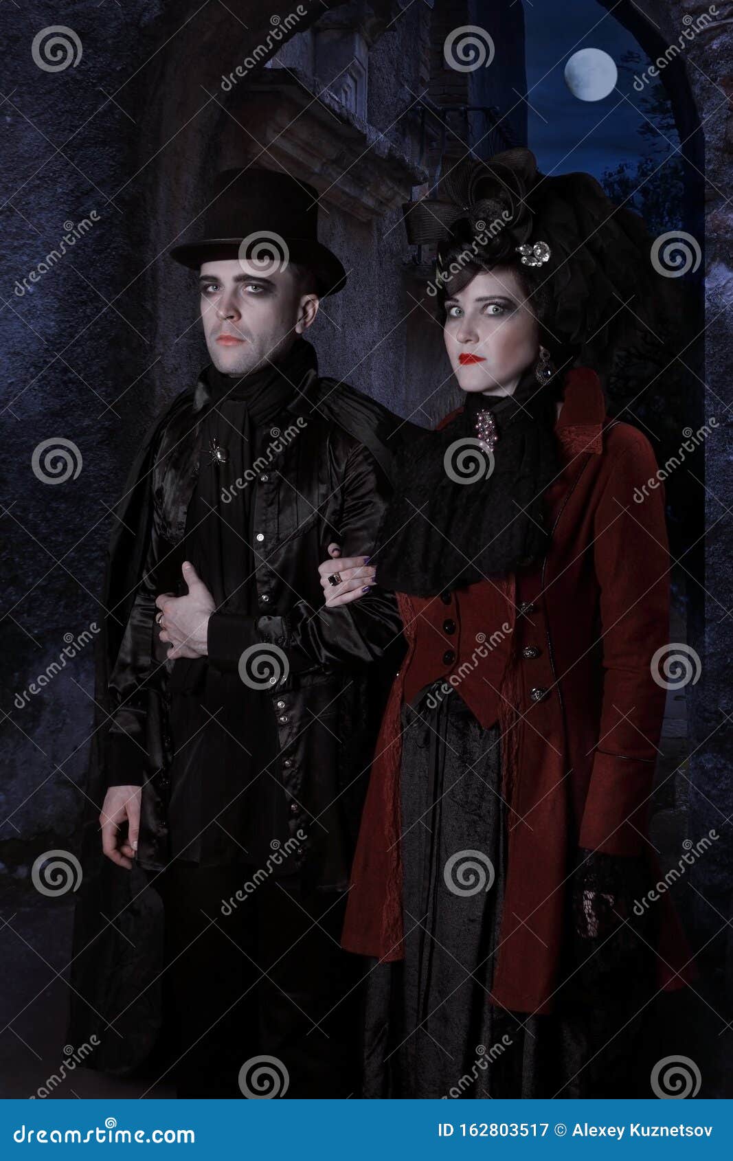 The Sinister Young Couple Dressed in Vampire Style Clothes Stock Image ...