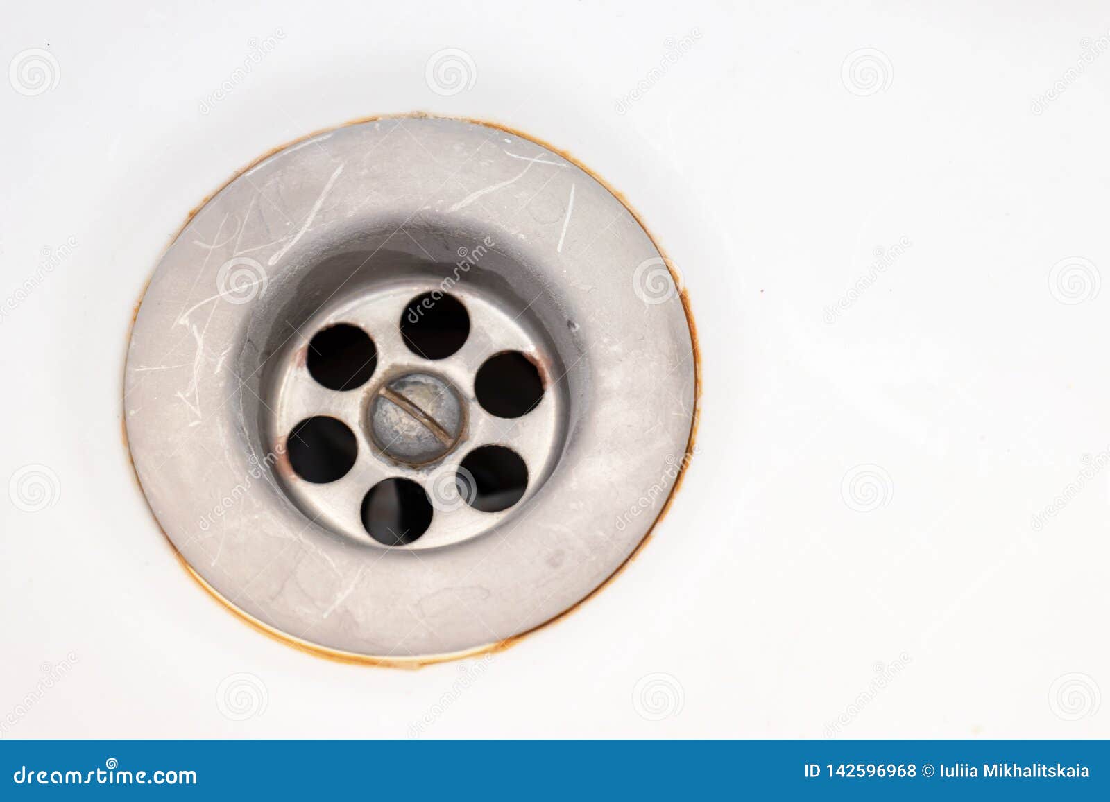 A Sink Drain Hole with Limescale or Lime Scale and Rust on it, Dirty